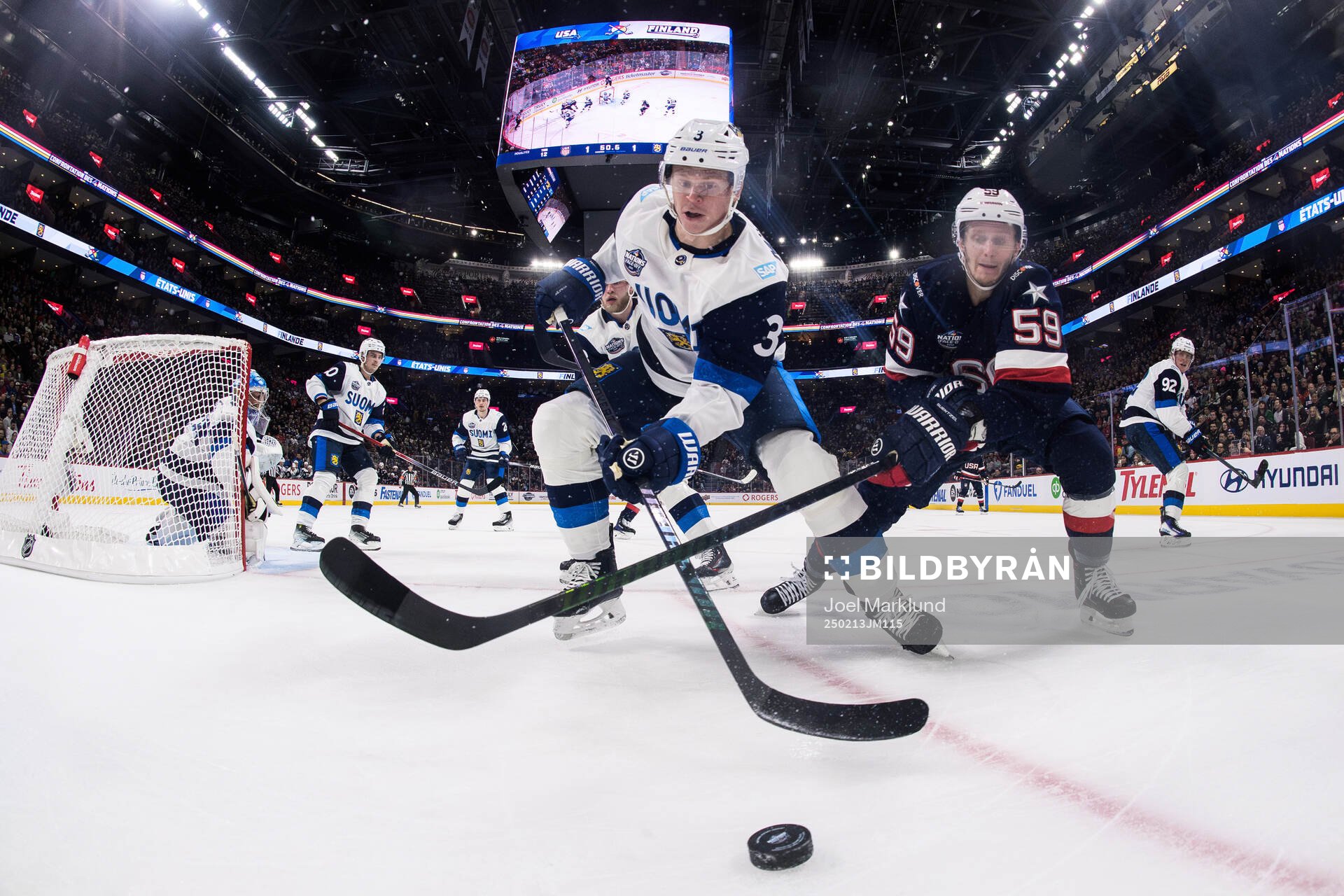 Olli Määttä of Finland and Jake Guentzel of USA