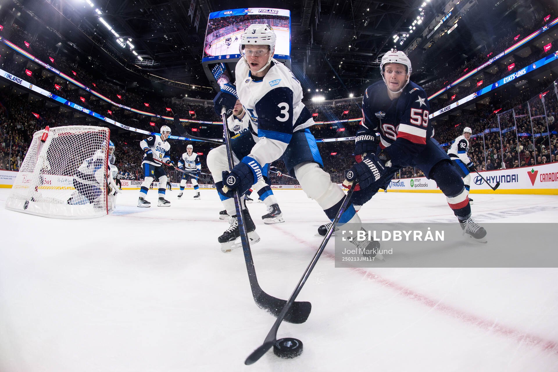 Olli Määttä of Finland and Jake Guentzel of USA