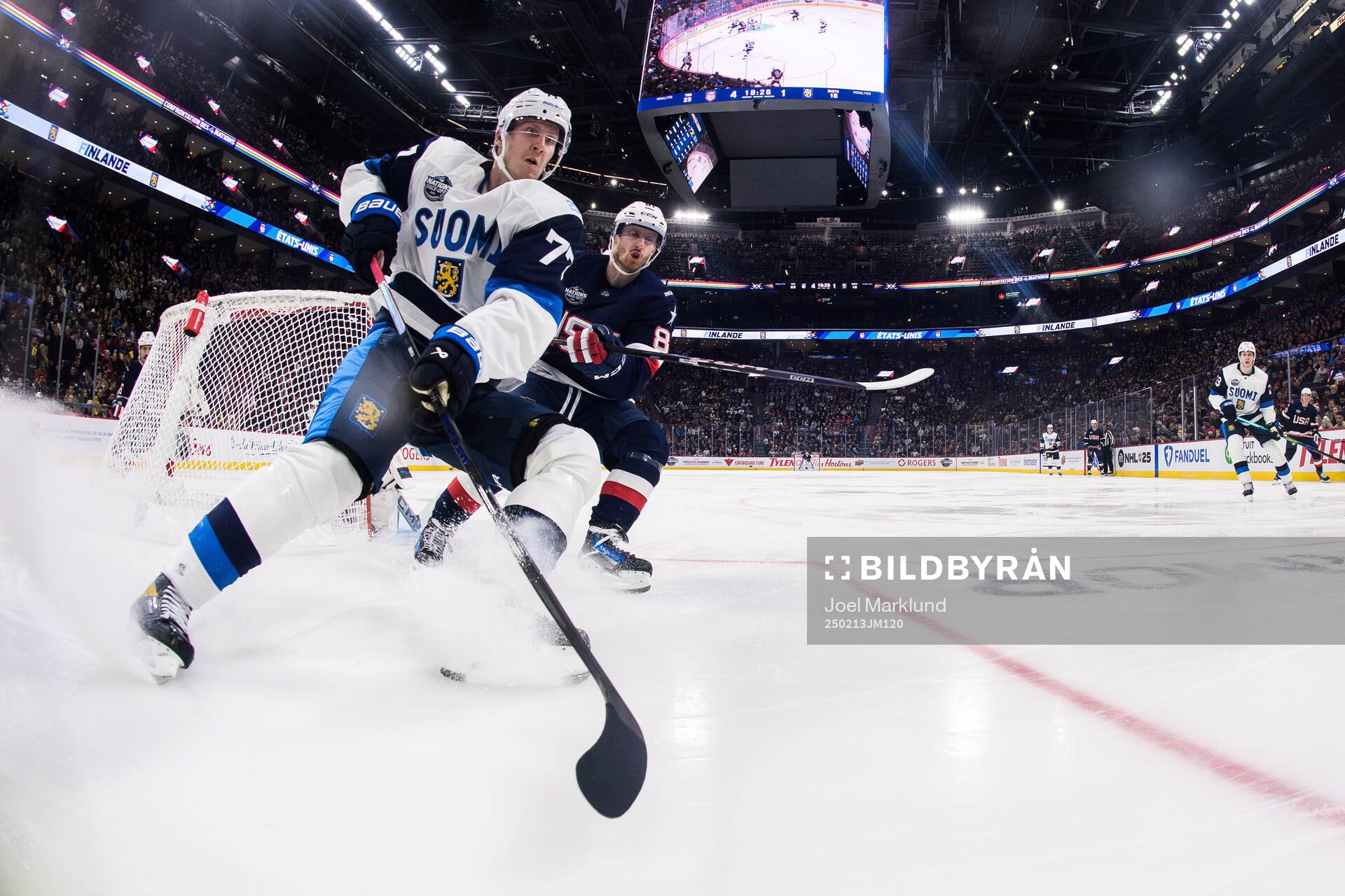 Niko Mikkola of Finland and Zach Werenski of USA