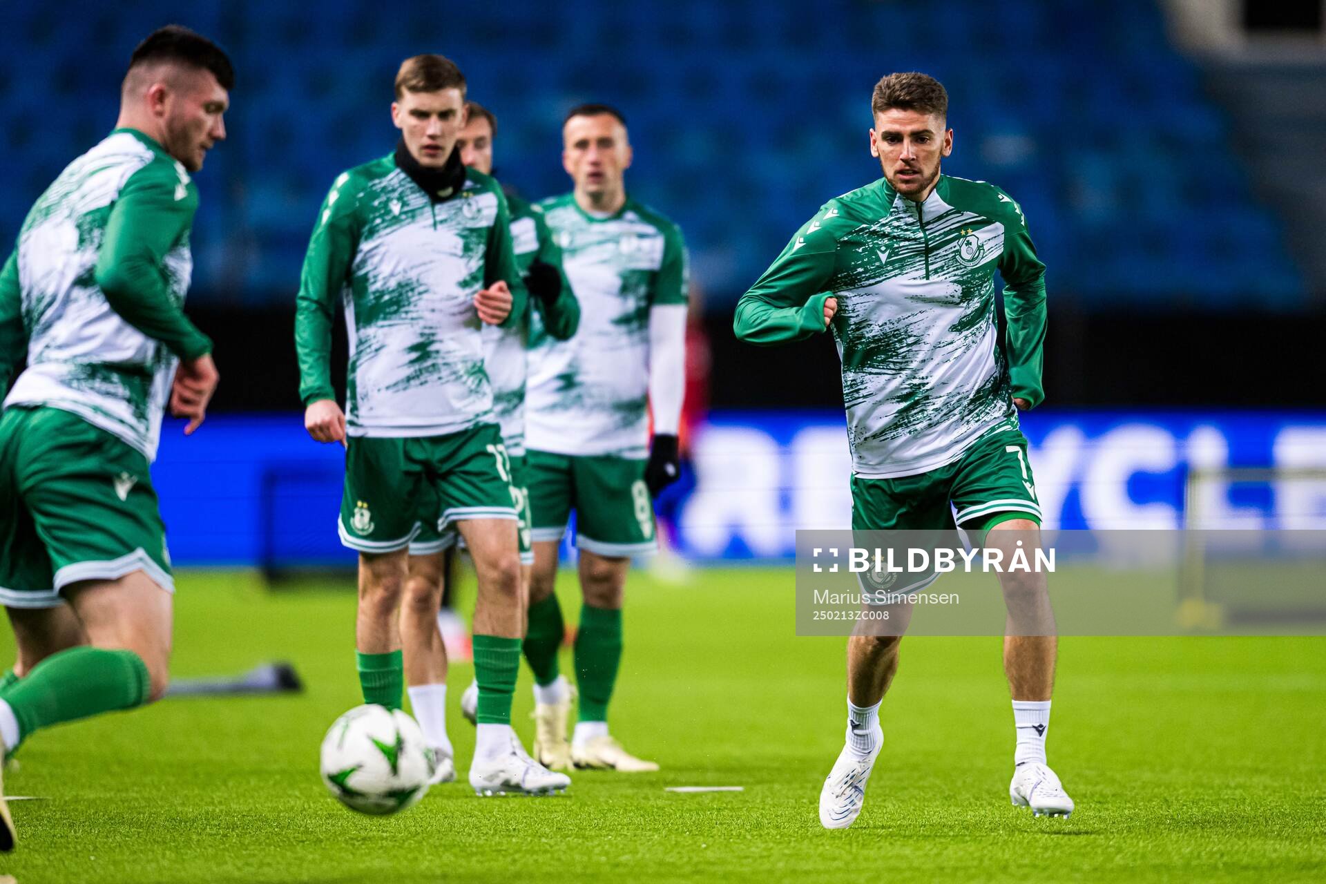 Dylan Watts of Shamrock Rovers warms up ahead of the UEFA Europa Conference League play-off match between Molde and Shamrock Rovers on February 13, 2025 in Molde.