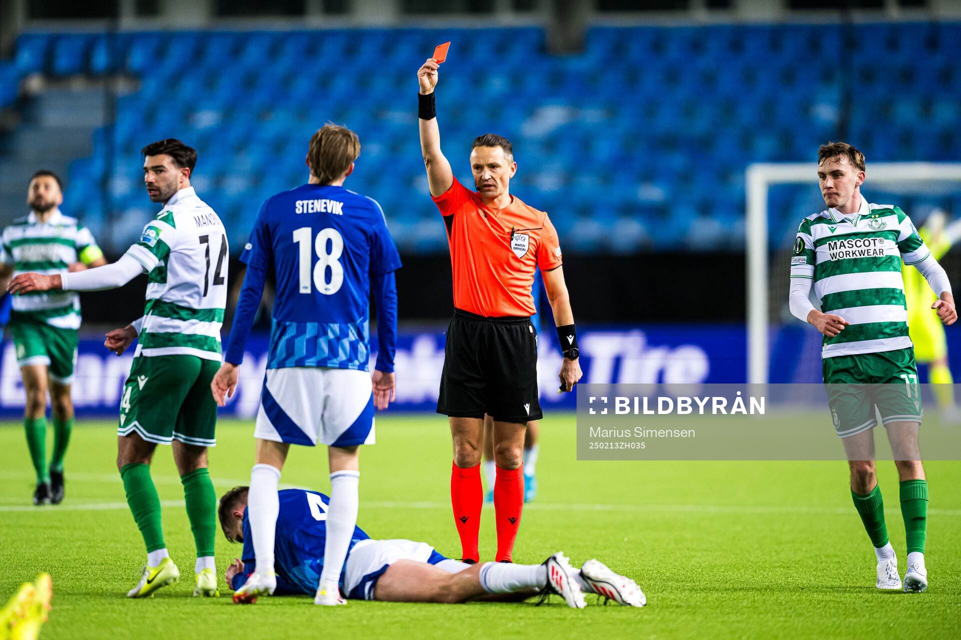 Valdemar Lund of Molde looks dejected after after receiving a yellow card by Andris Treimanis, referee, during the UEFA Europa Conference League play-off match between Molde and Shamrock Rovers on February 13, 2025 in Molde.