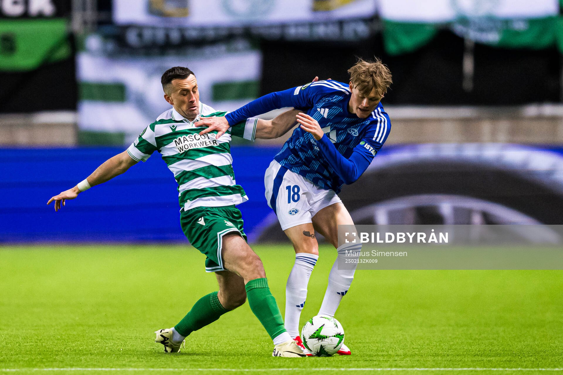 Aaron McEneff of Shamrock Rovers and Halldor Stenevik of