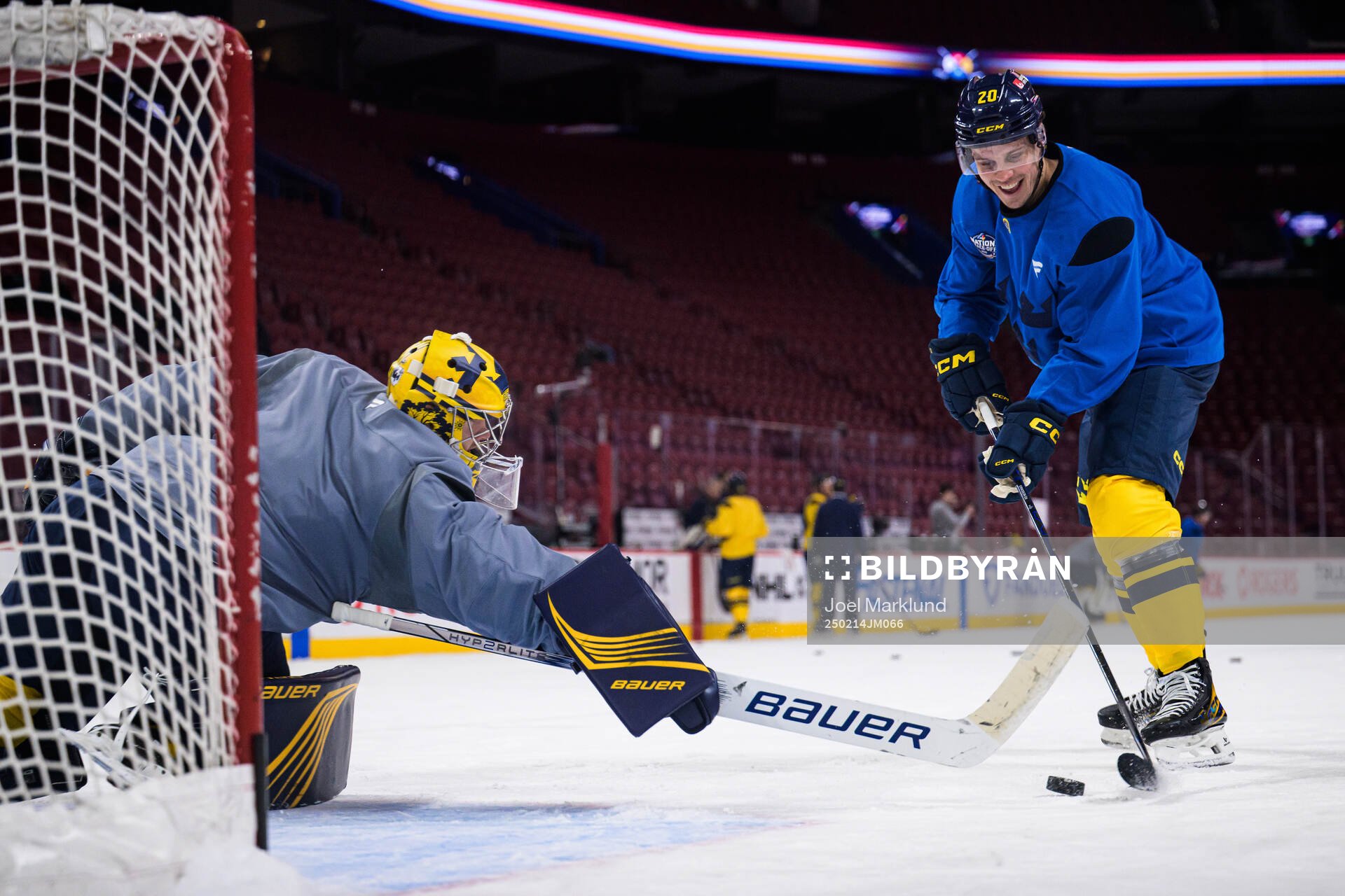 Goaltender Filip Gustavsson and Joel Eriksson Ek of Sweden