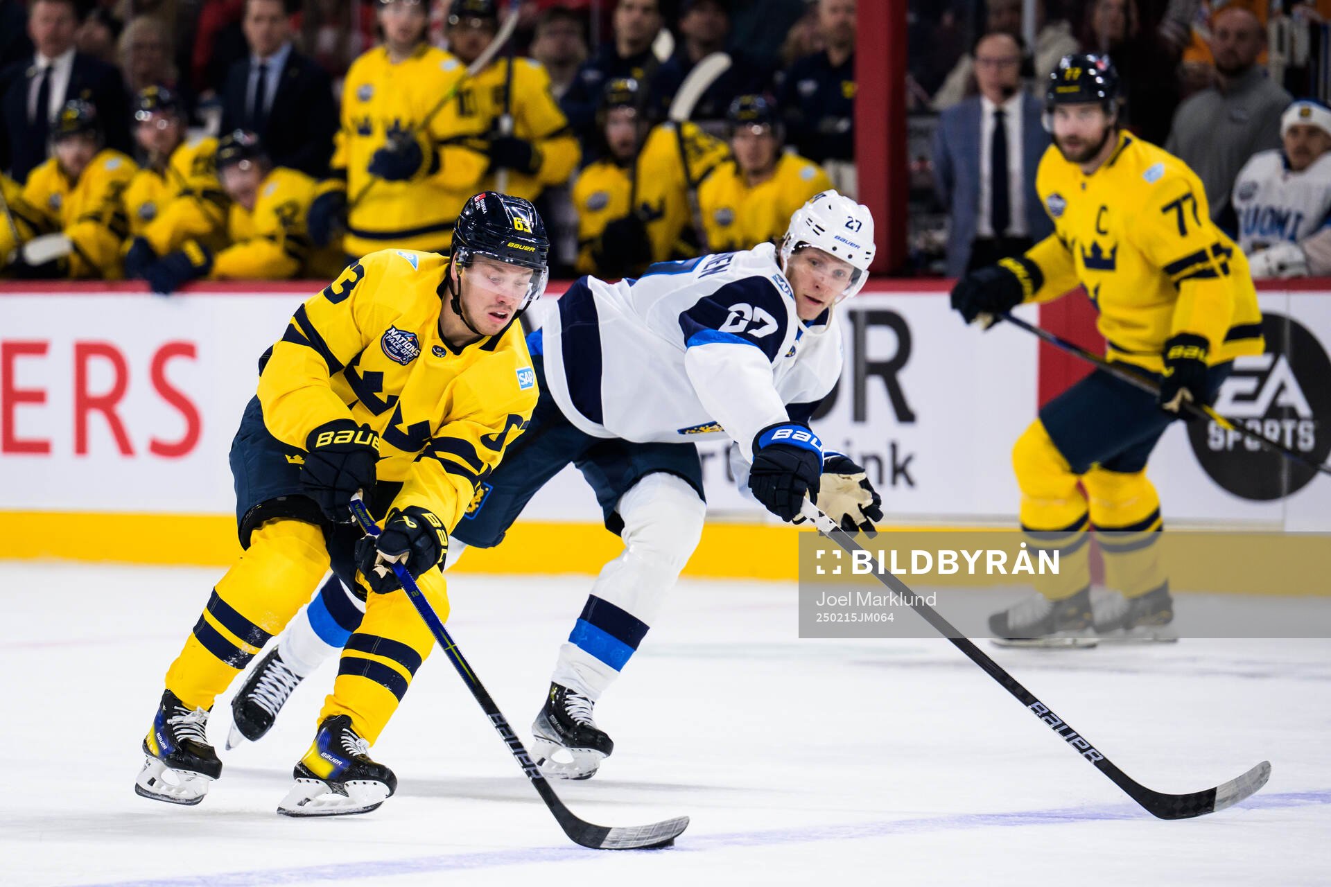 Jesper Bratt of Sweden and Eetu Luostarinen of Finland