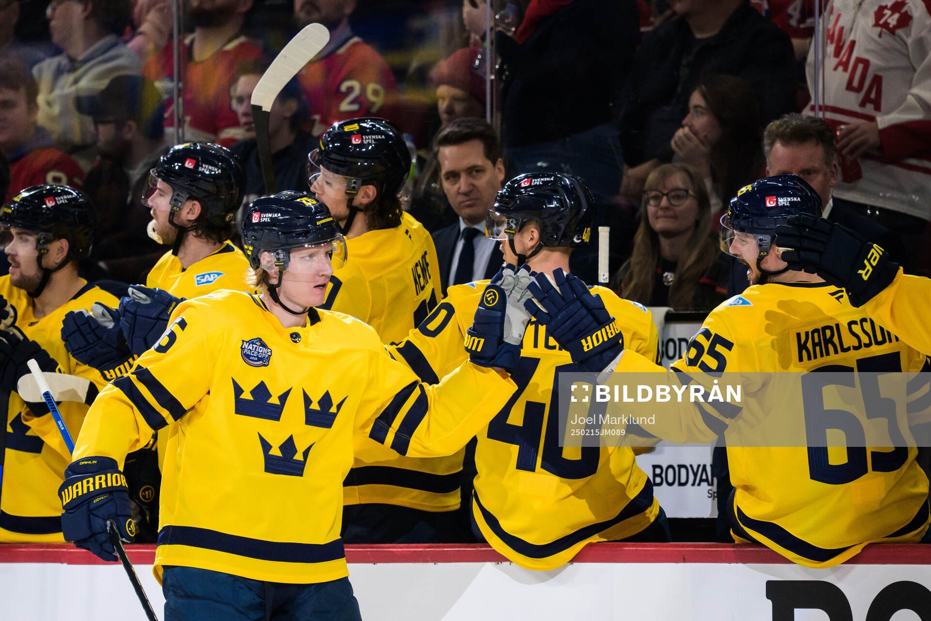 Rasmus Dahlin of Sweden celebrates with teammates