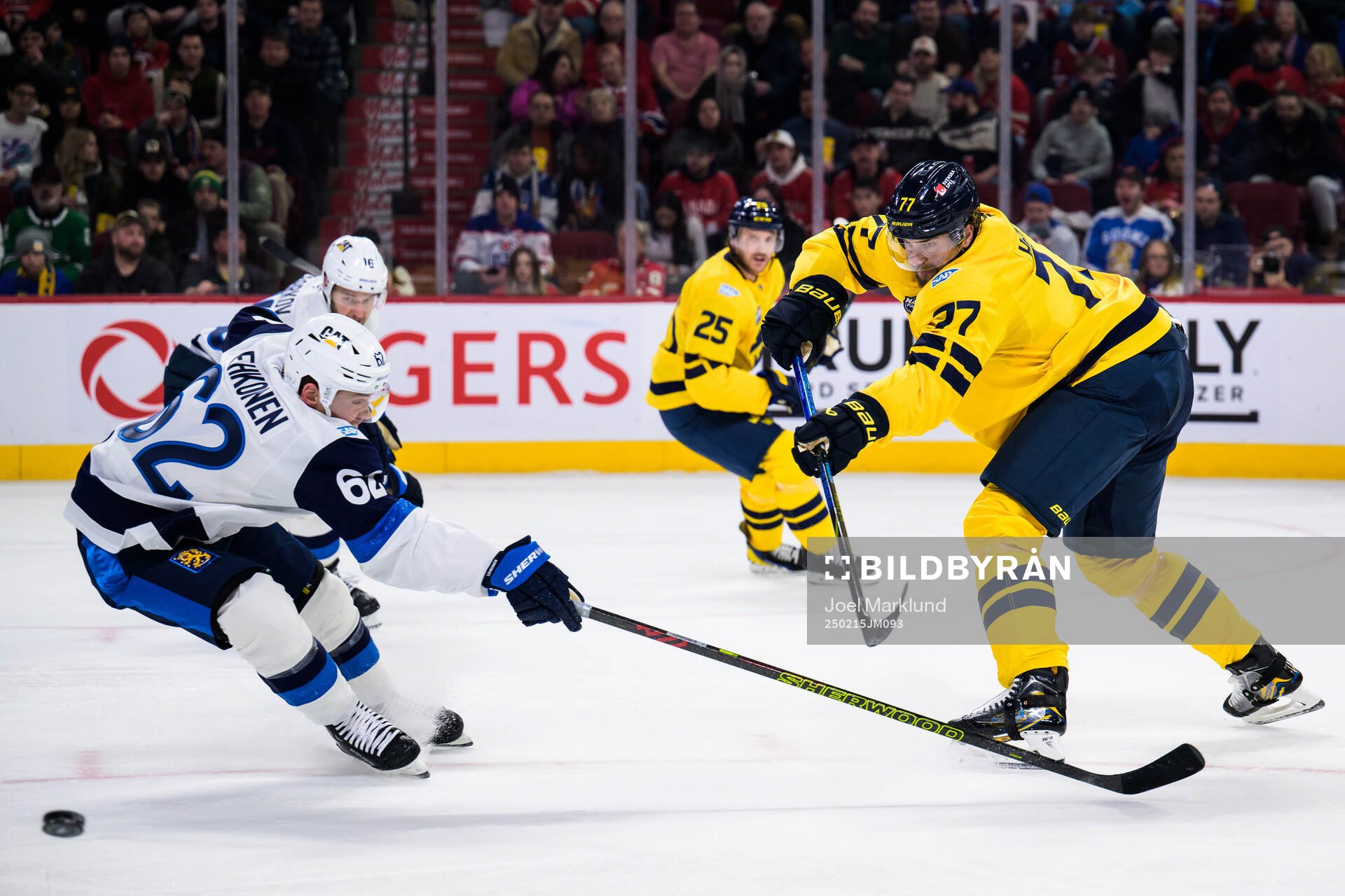 Artturi Lehkonen of Finland and Victor Hedman of Sweden