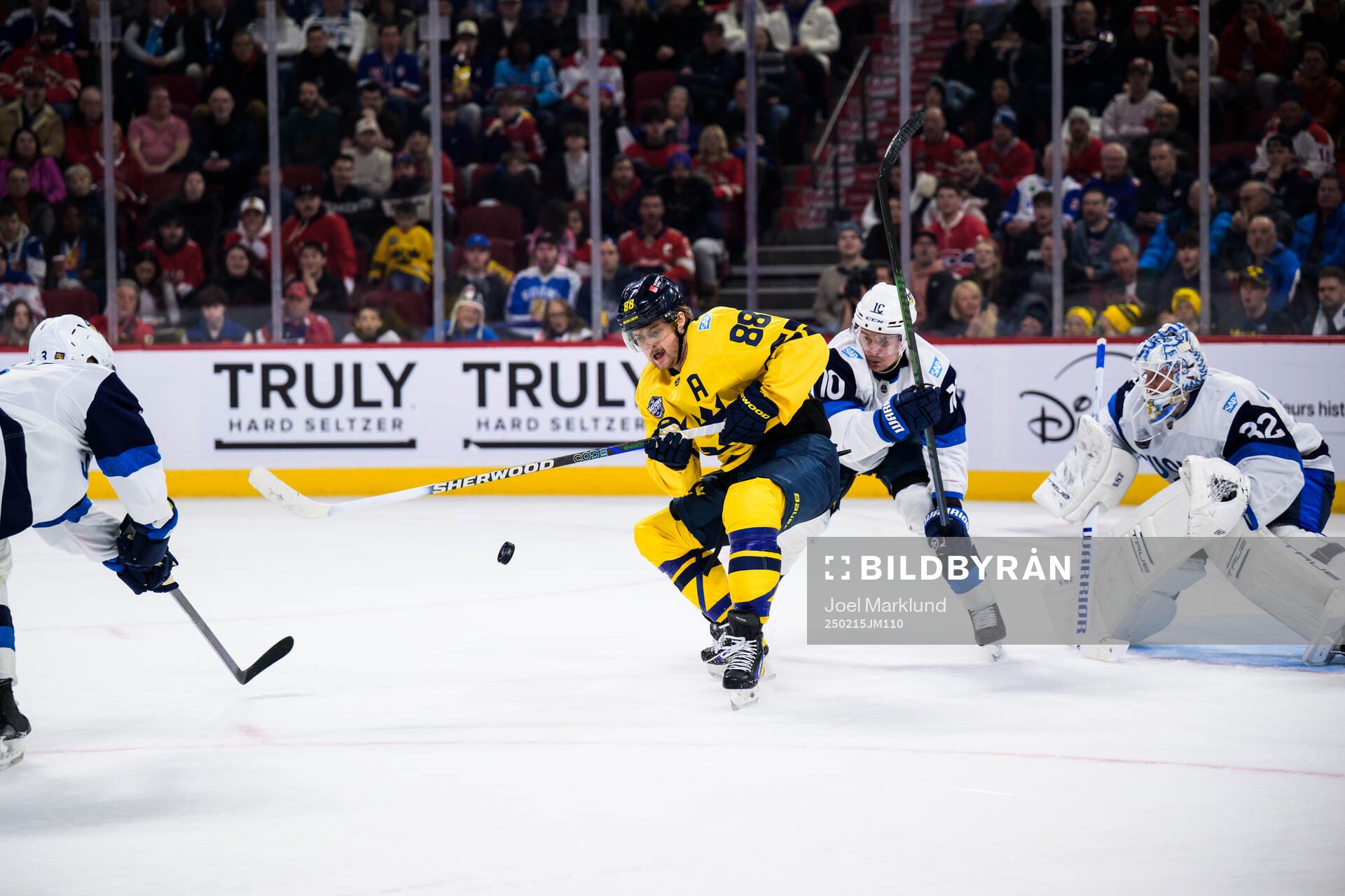 William Nylander of Sweden and Henri Jokiharju of Finland