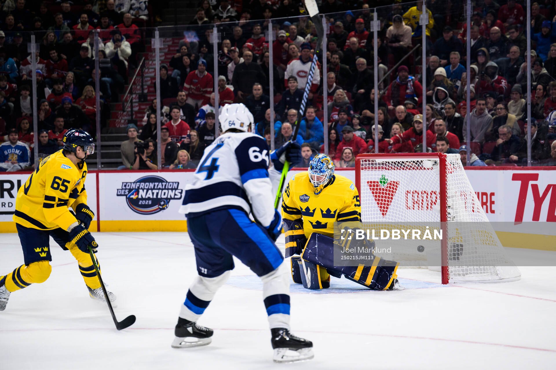 Mikael Granlund of Finland scores the game-winning 3-4 goal
