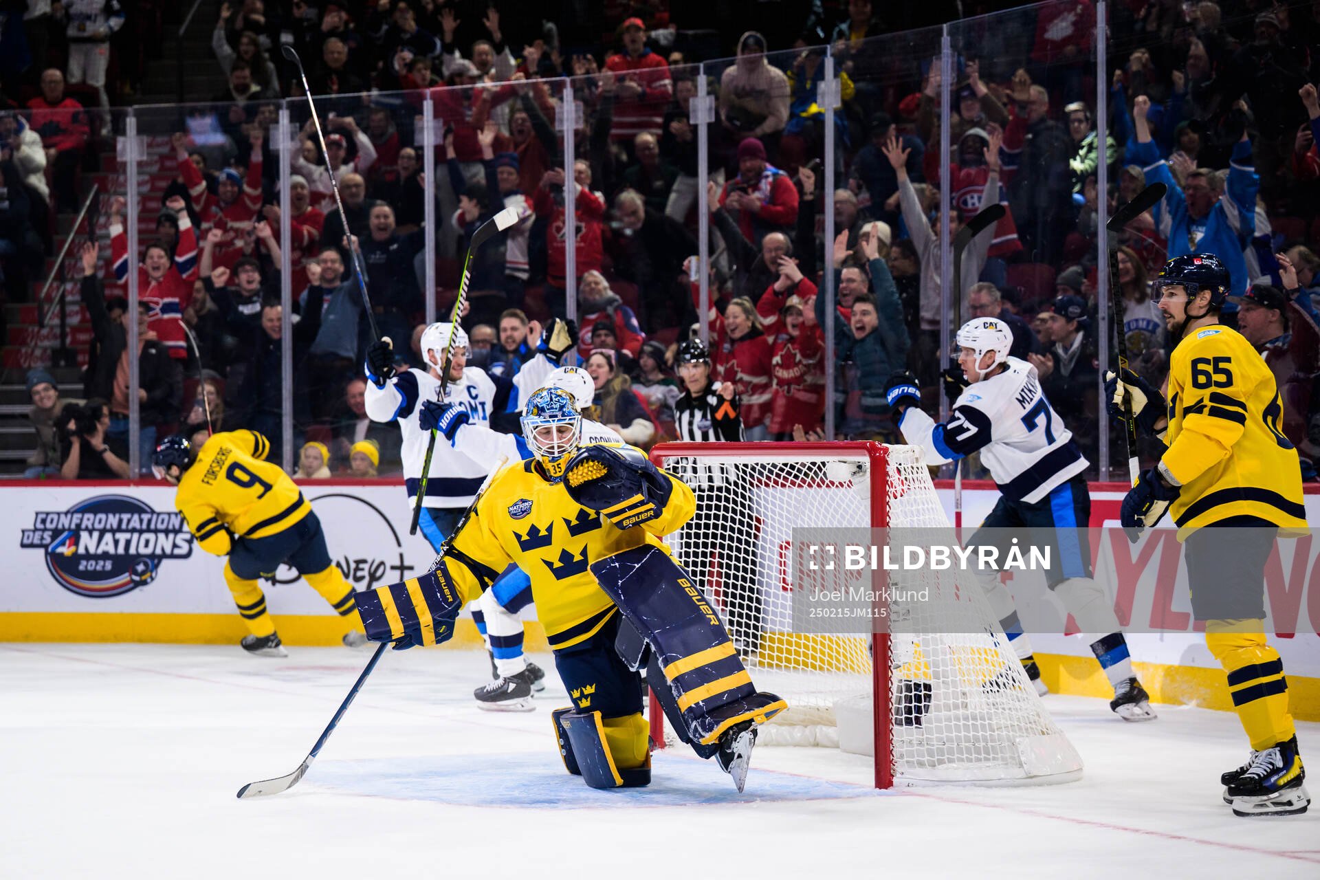 Goaltender Linus Ullmark of Sweden looks dejected