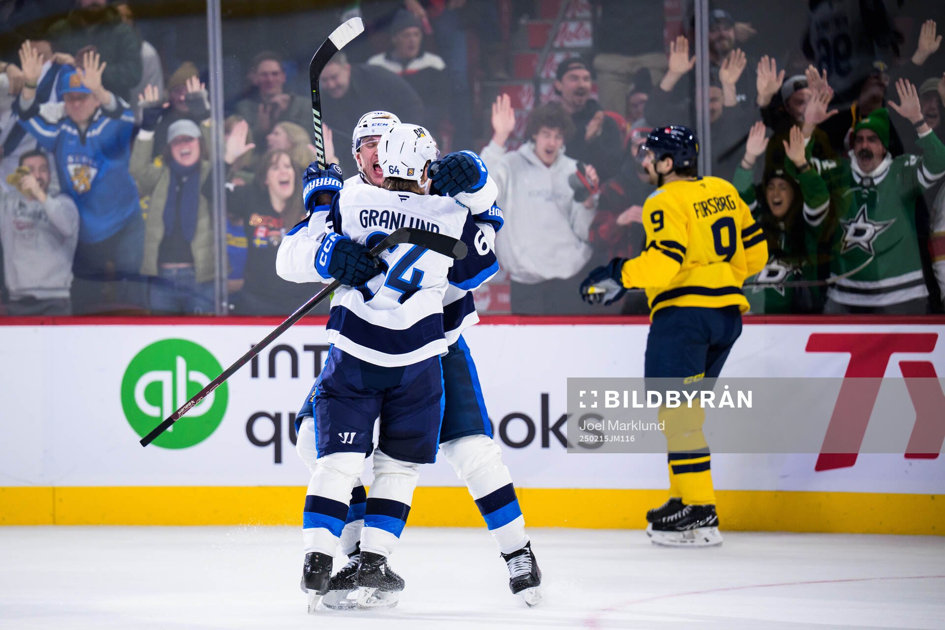 Mikko Rantanen and Mikael Granlund of Finland celebrate the