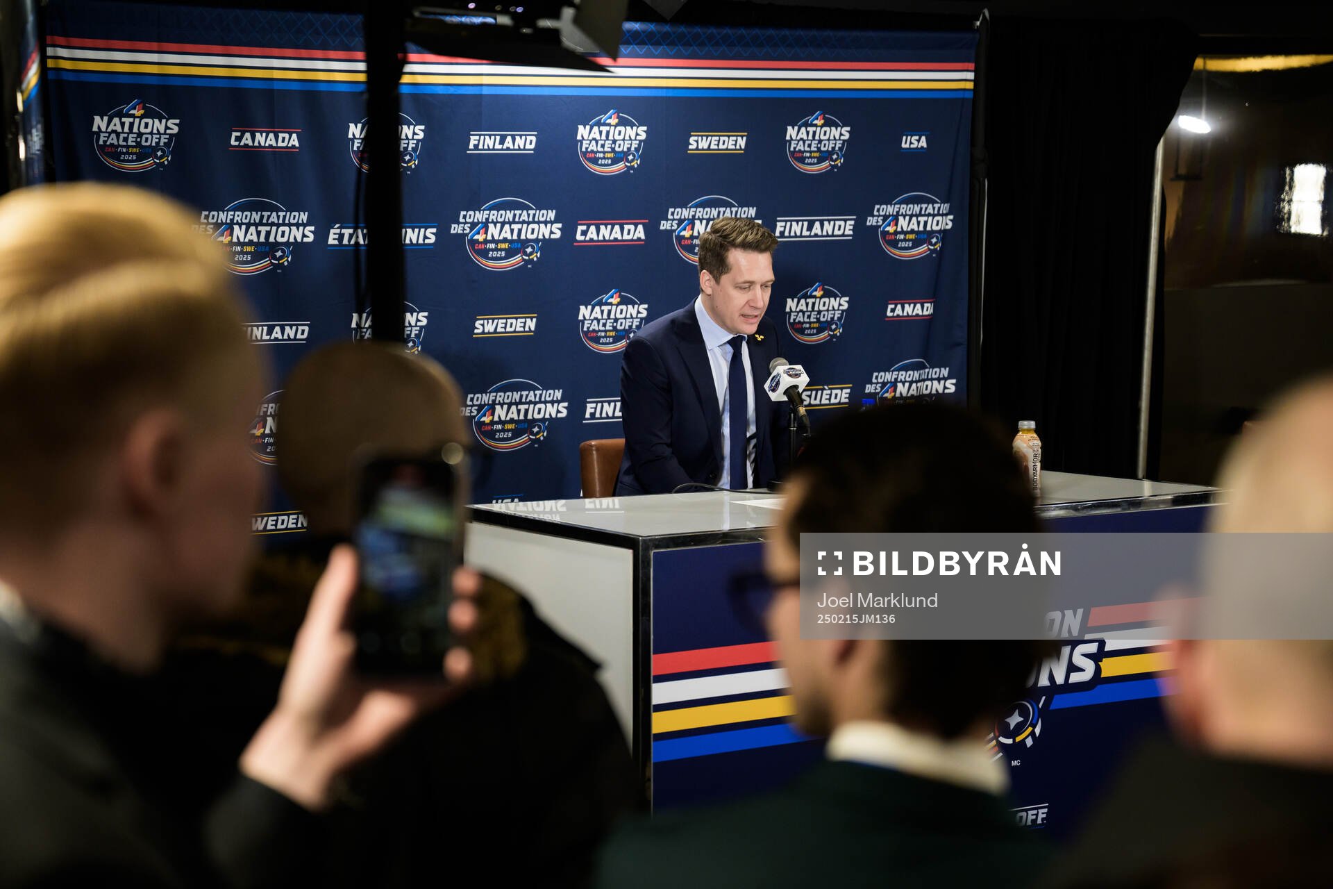 Head coach Sam Hallam of Sweden talks to media