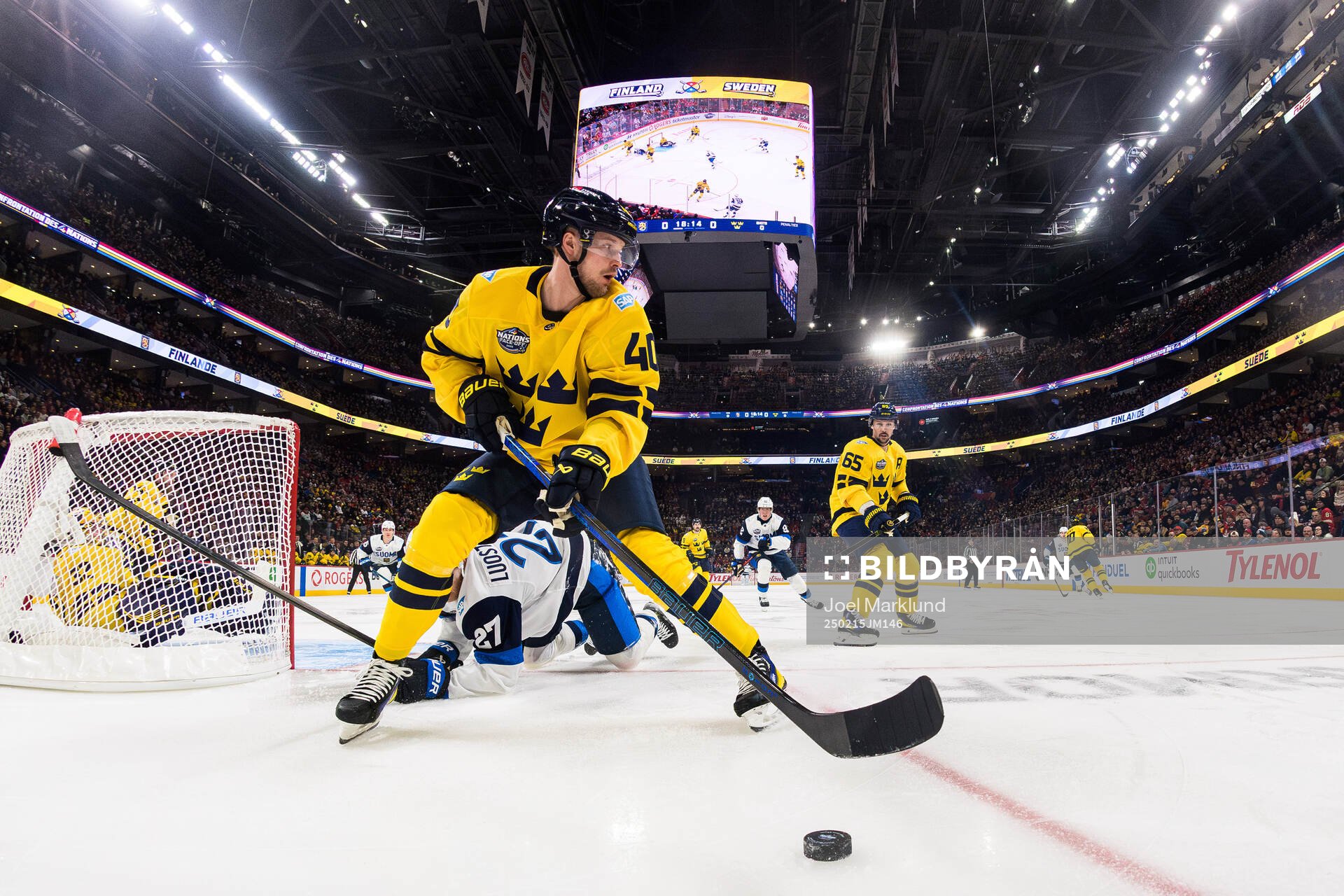 Elias Pettersson and Erik Karlsson of Sweden in action