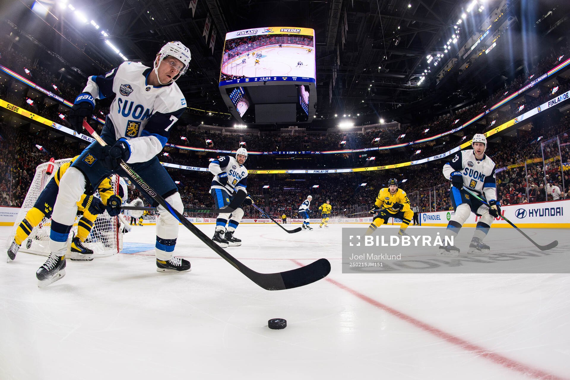 Niko Mikkola, Aleksander Barkov and Esa Lindell of Finland