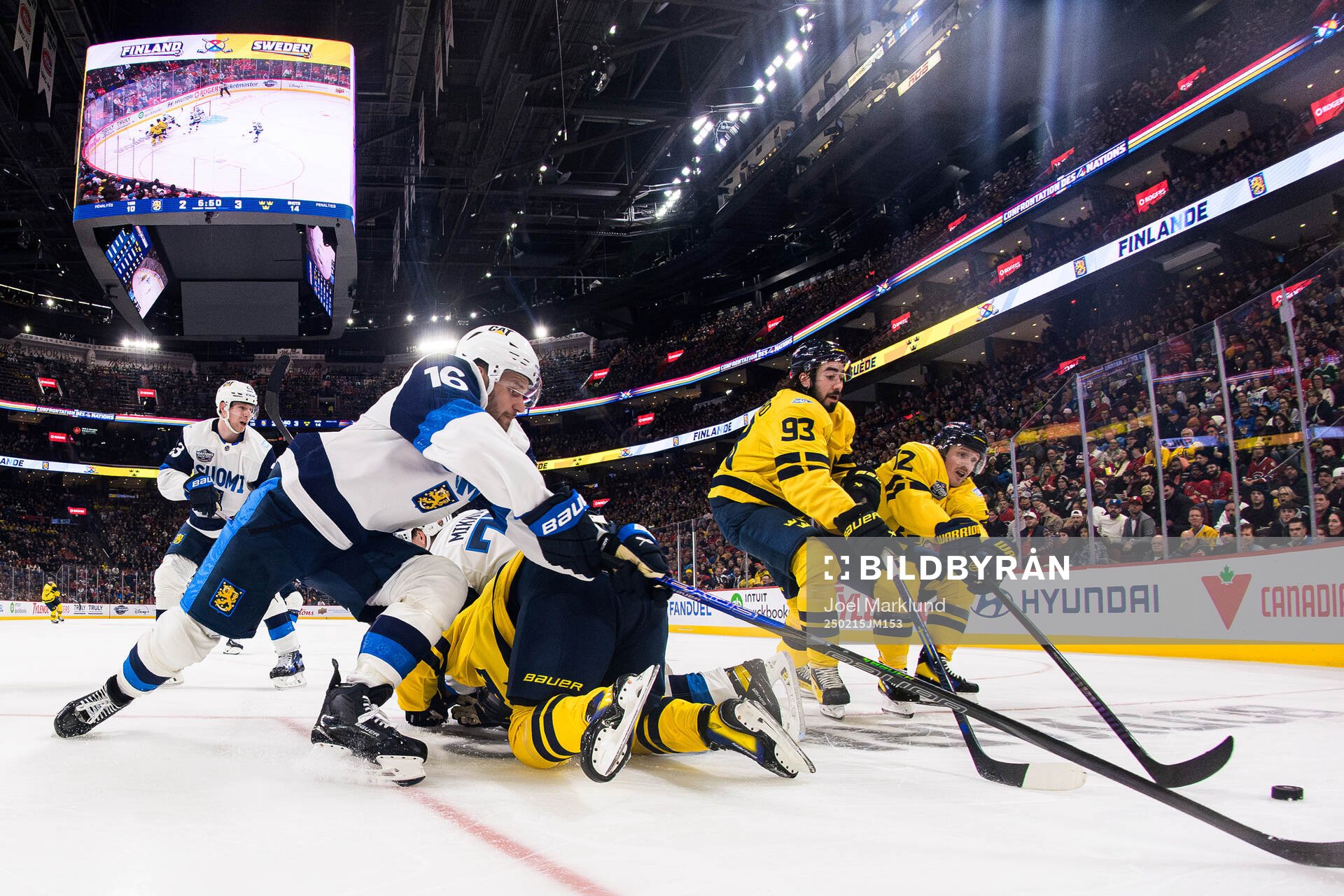 Aleksander Barkov of Finland in action against Mika