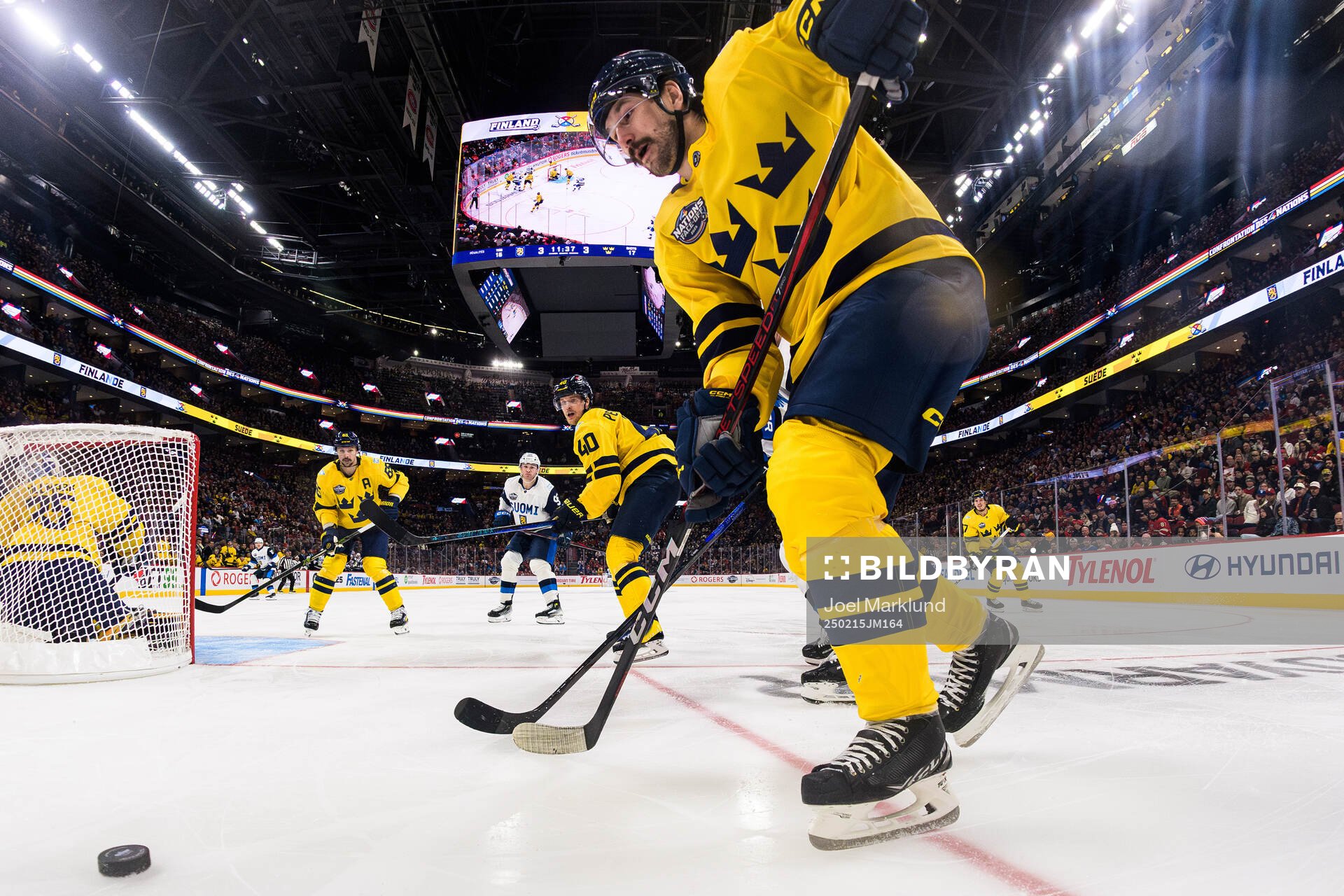 Erik Karlsson, Elias Pettersson and Filip Forsberg of Sweden