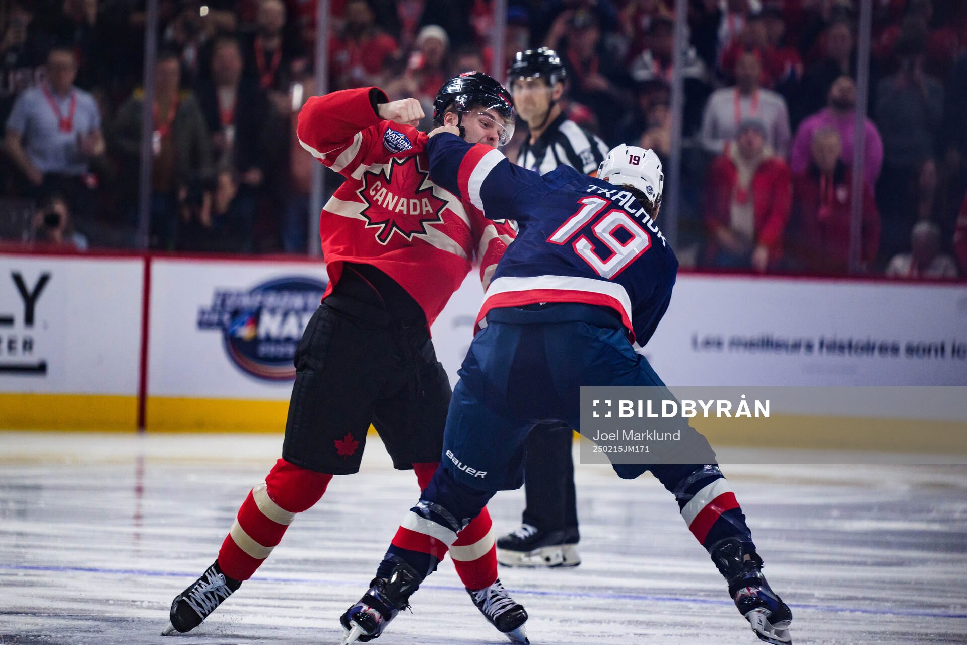 Brandon Hagel of Canada and Matthew Tkachuk of USA fight