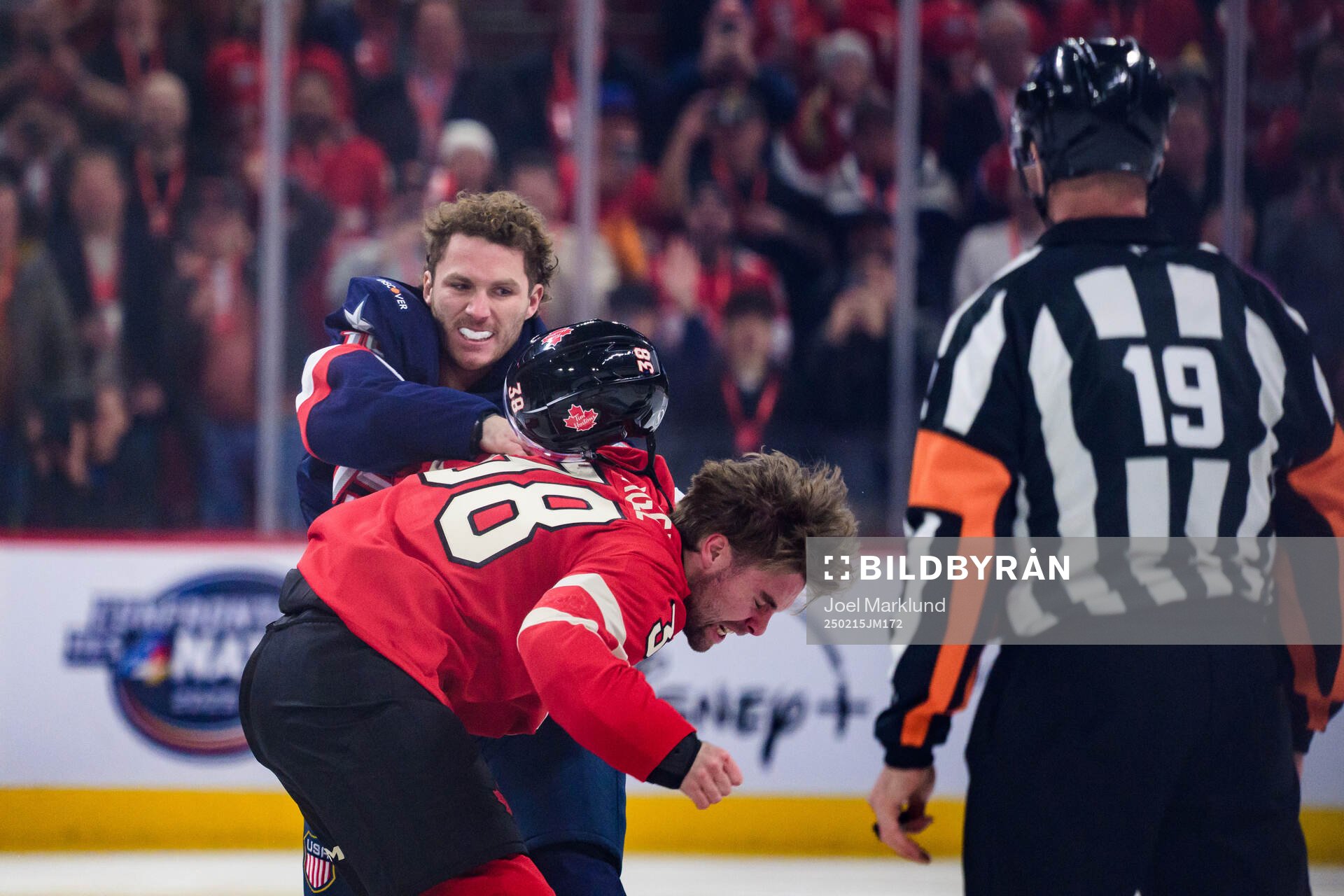 Brandon Hagel of Canada and Matthew Tkachuk of USA fight