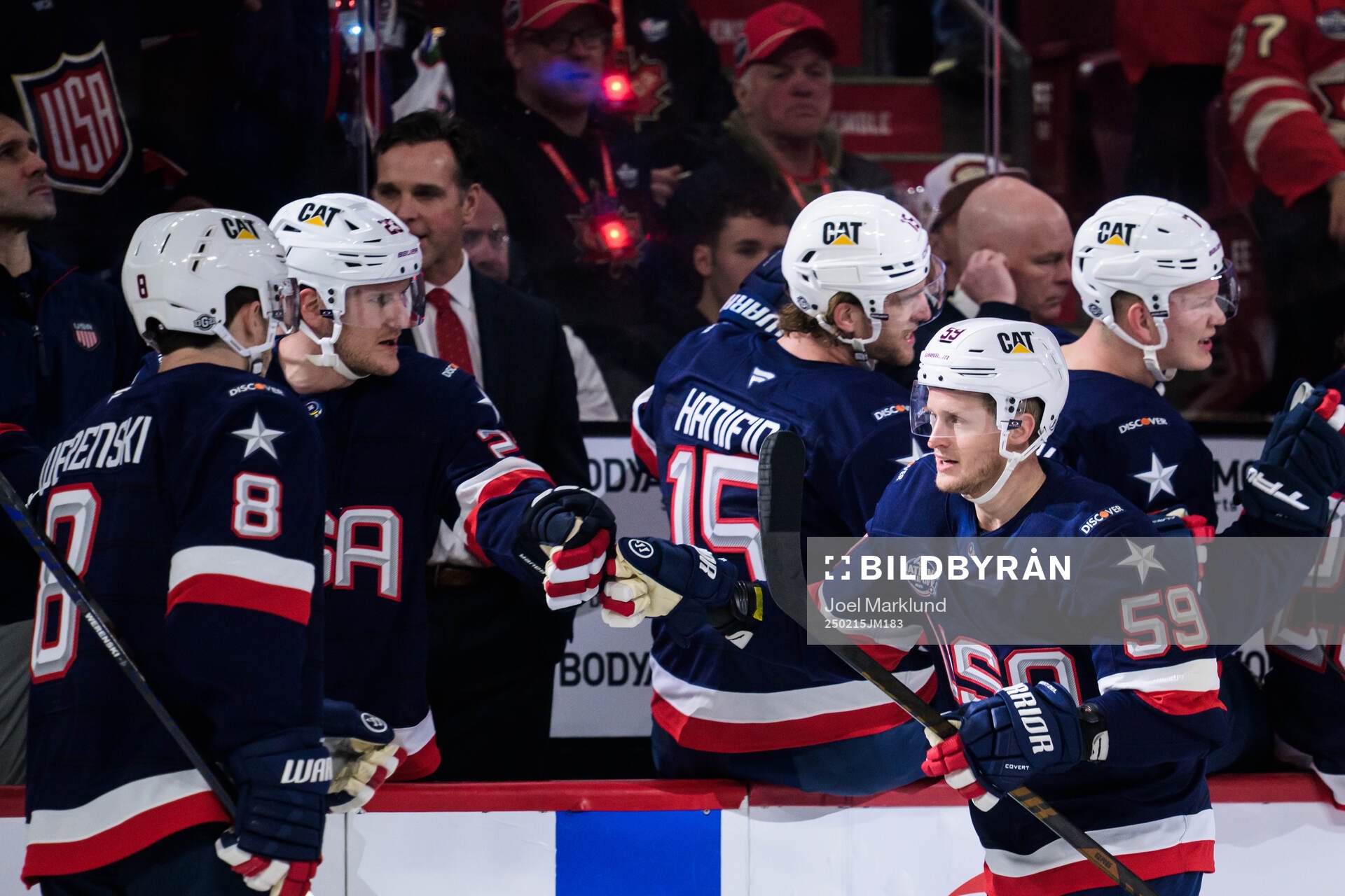 Jake Guentzel of USA celebrates with teammates