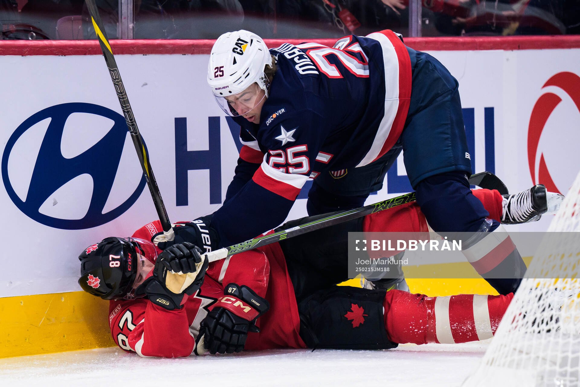 Sidney Crosby of Canada and Charlie McAvoy of USA