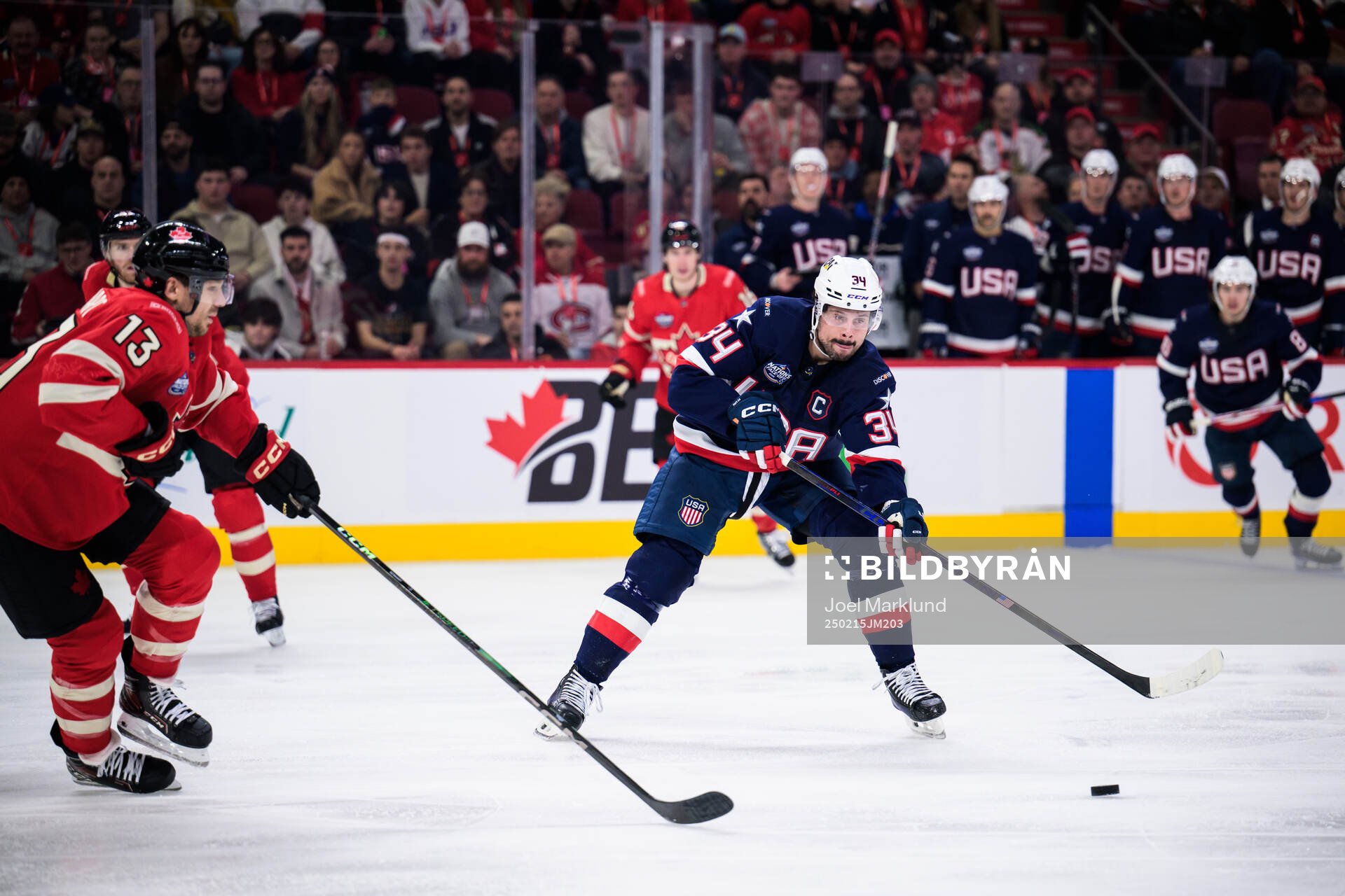 Sam Reinhart of Canada and Auston Matthews of USA