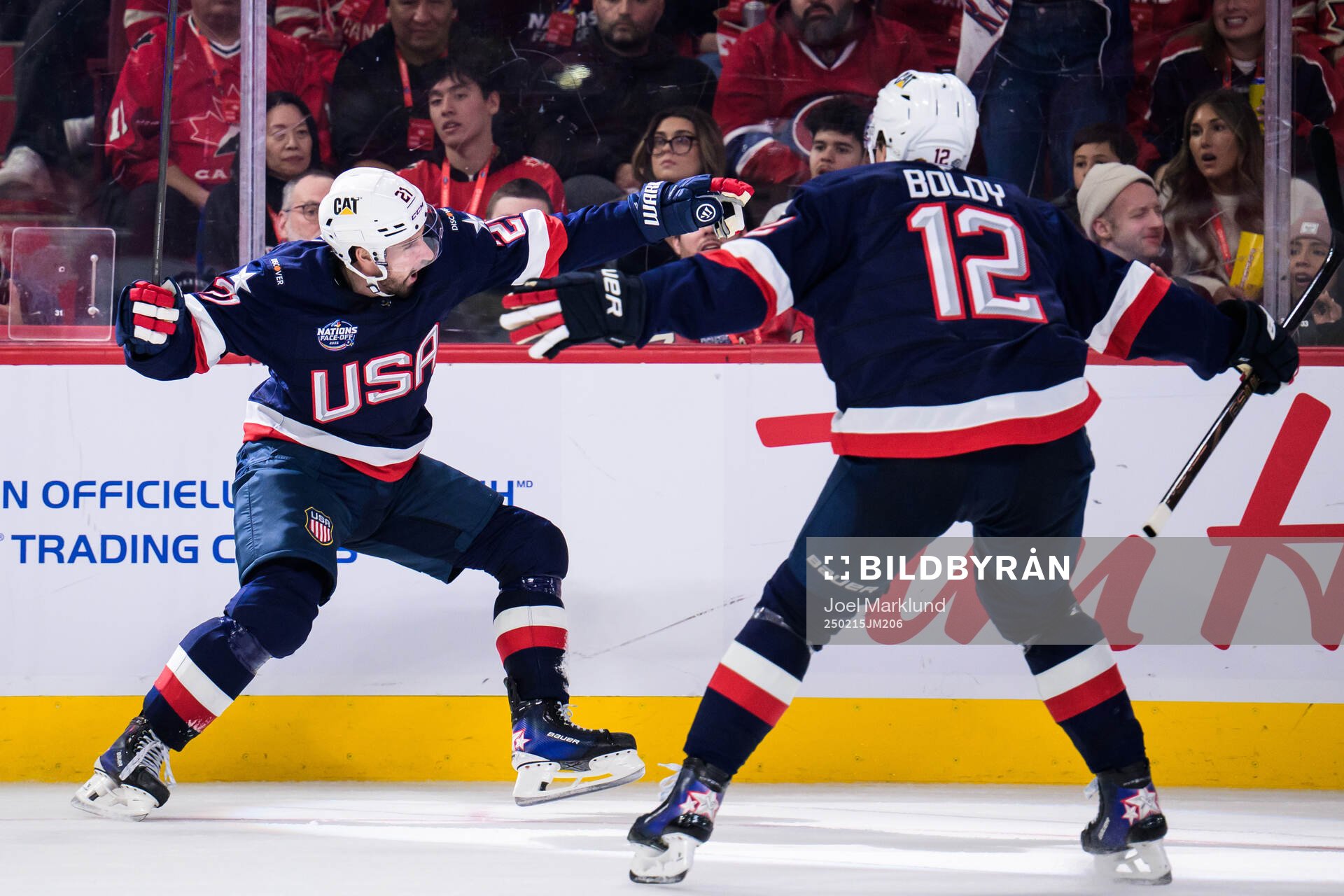 Dylan Larkin and Matt Boldy of USA celebrate the 1-2 goal