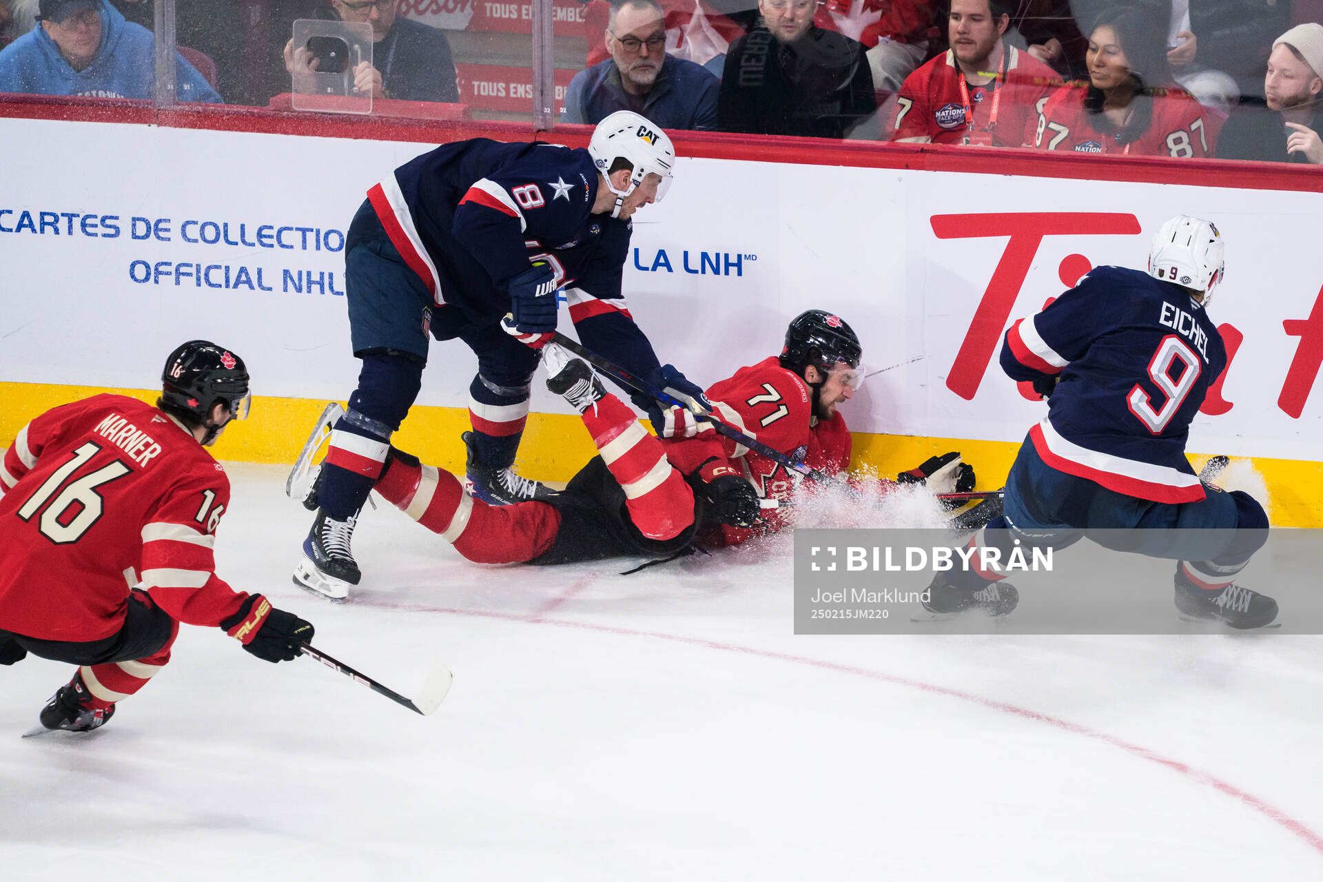 Mitch Marner and Anthony Cirelli of Canada are being