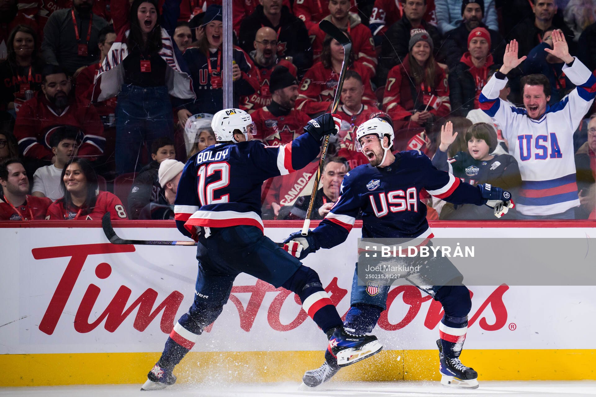 Matt Boldy and Dylan Larkin of USA celebrate the 1-2 goal