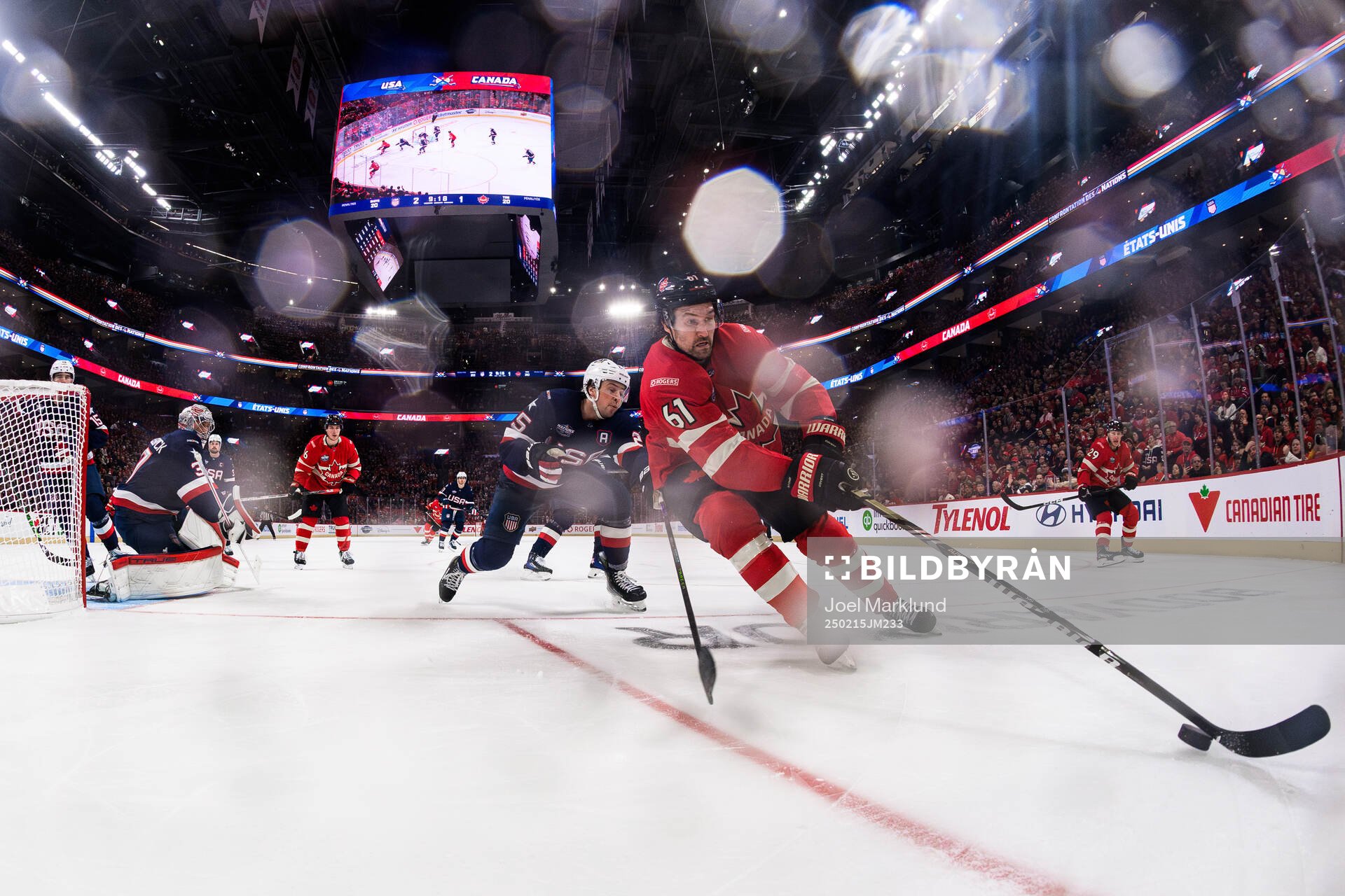 Charlie McAvoy of USA and Mark Stone of Canada