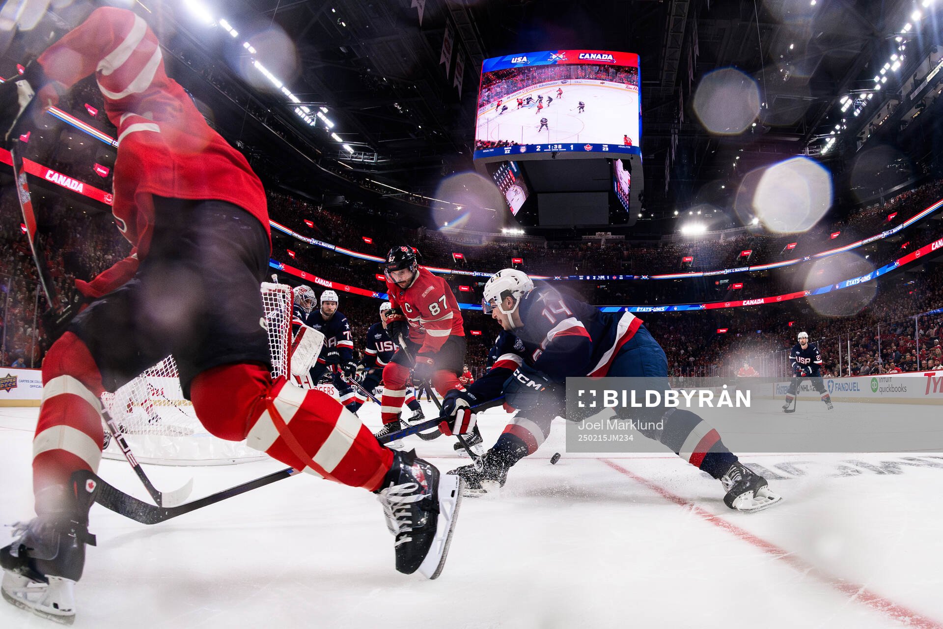 Goaltender Connor Hellebuyck and Brock Faber of USA are