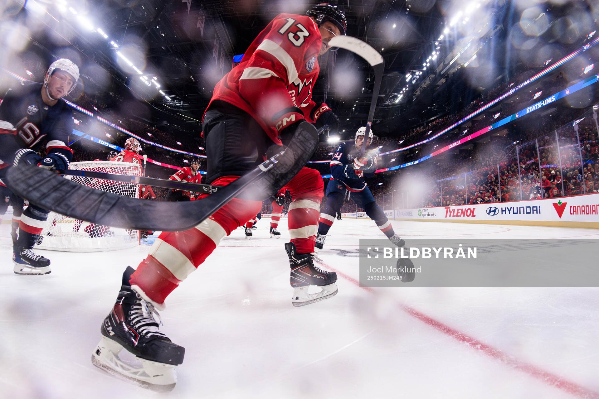 Zach Werenski and Auston Matthews of USA are being