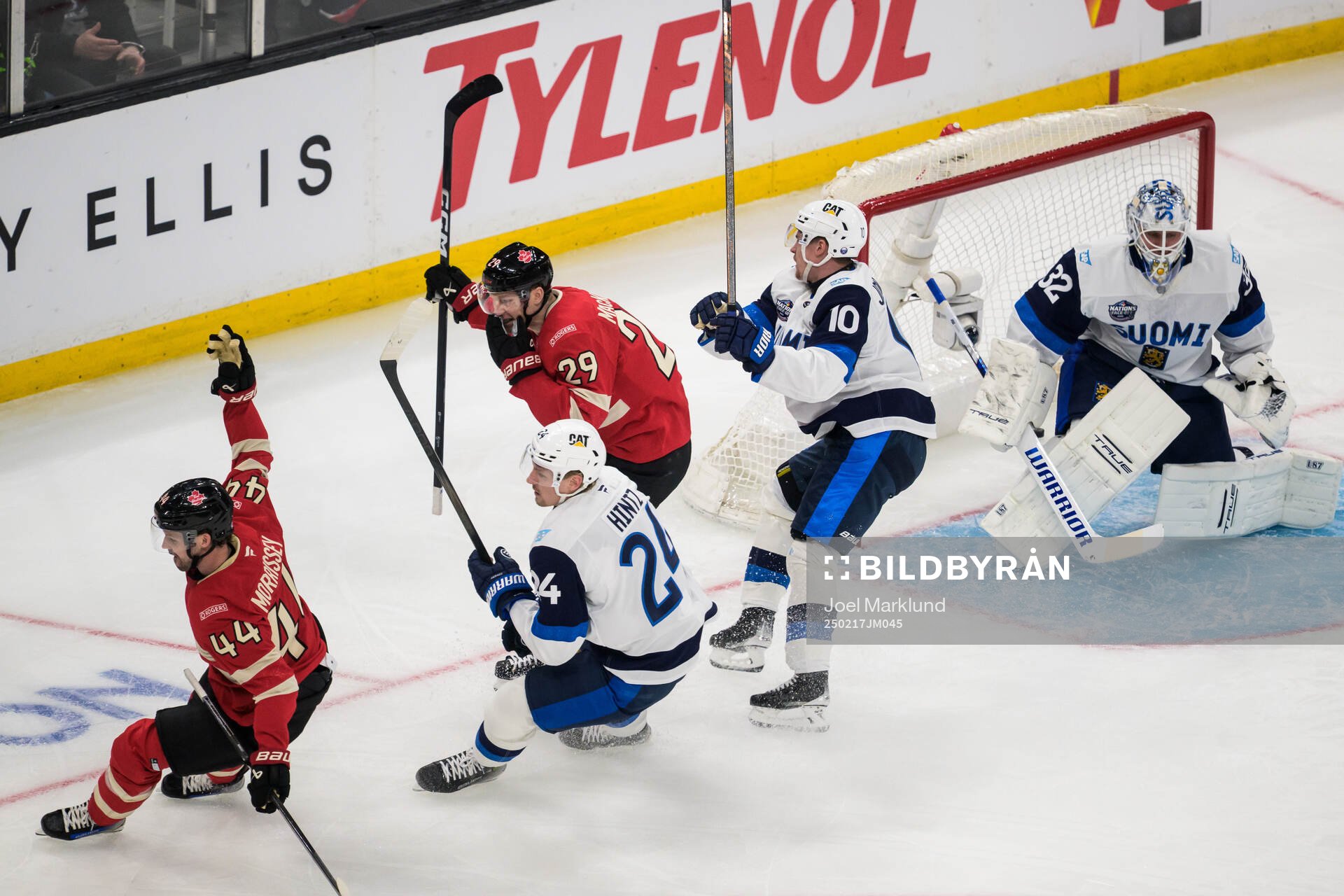 Josh Morrissey and Nathan MacKinnon of Canada celebrate the