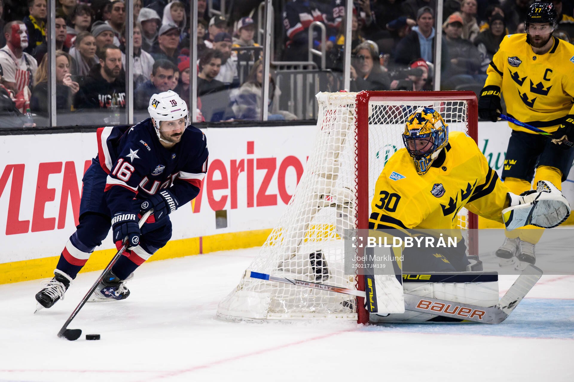 Vincent Trocheck of USA and goaltender Samuel Ersson of