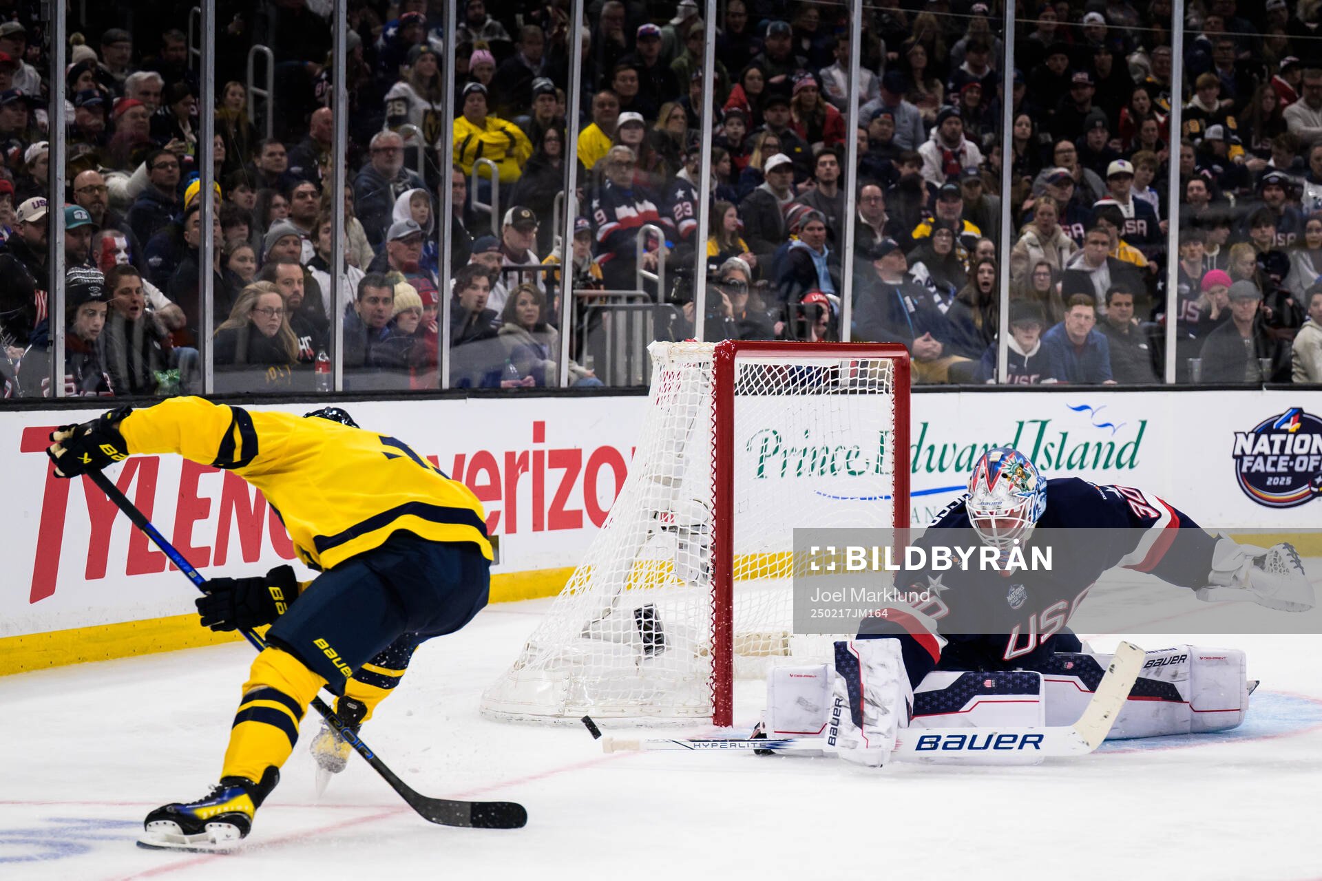 Viktor Arvidsson of Sweden and goaltender Jake Oettinger of