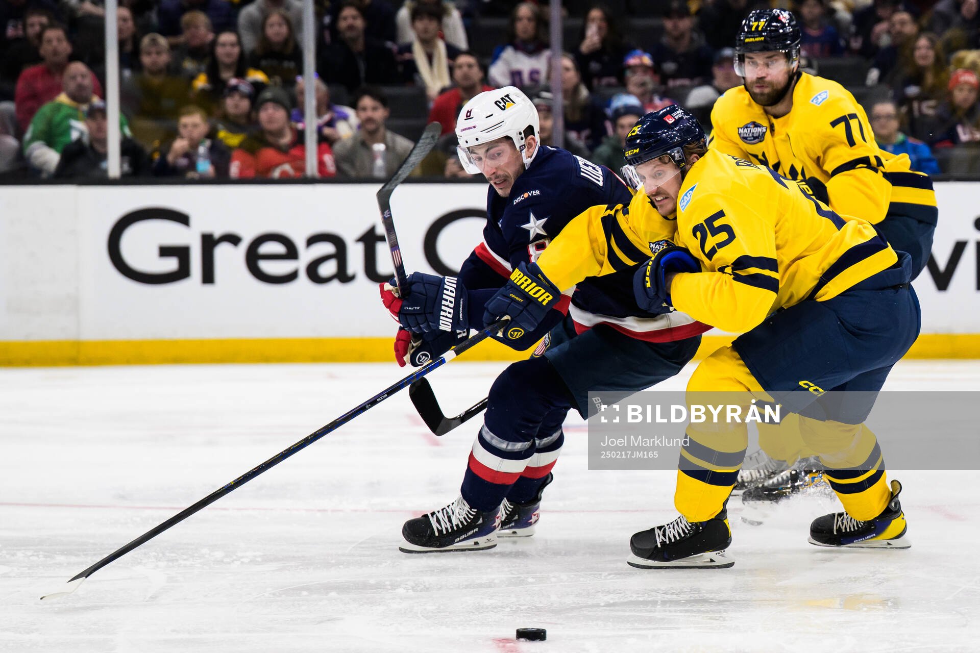 Zach Werenski of USA in action against Jonas Brodin and