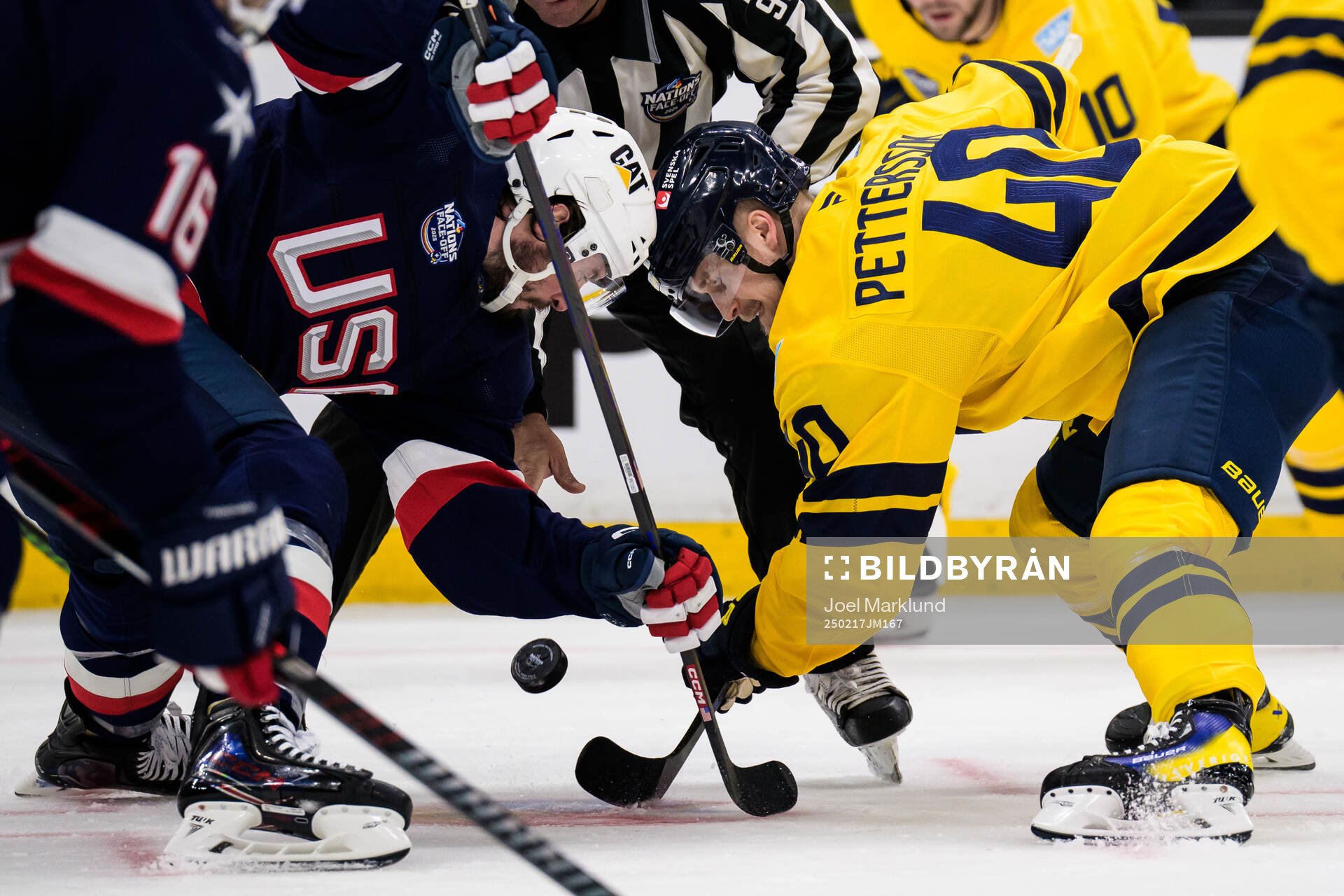 J.T. Miller of USA and Elias Pettersson of Sweden