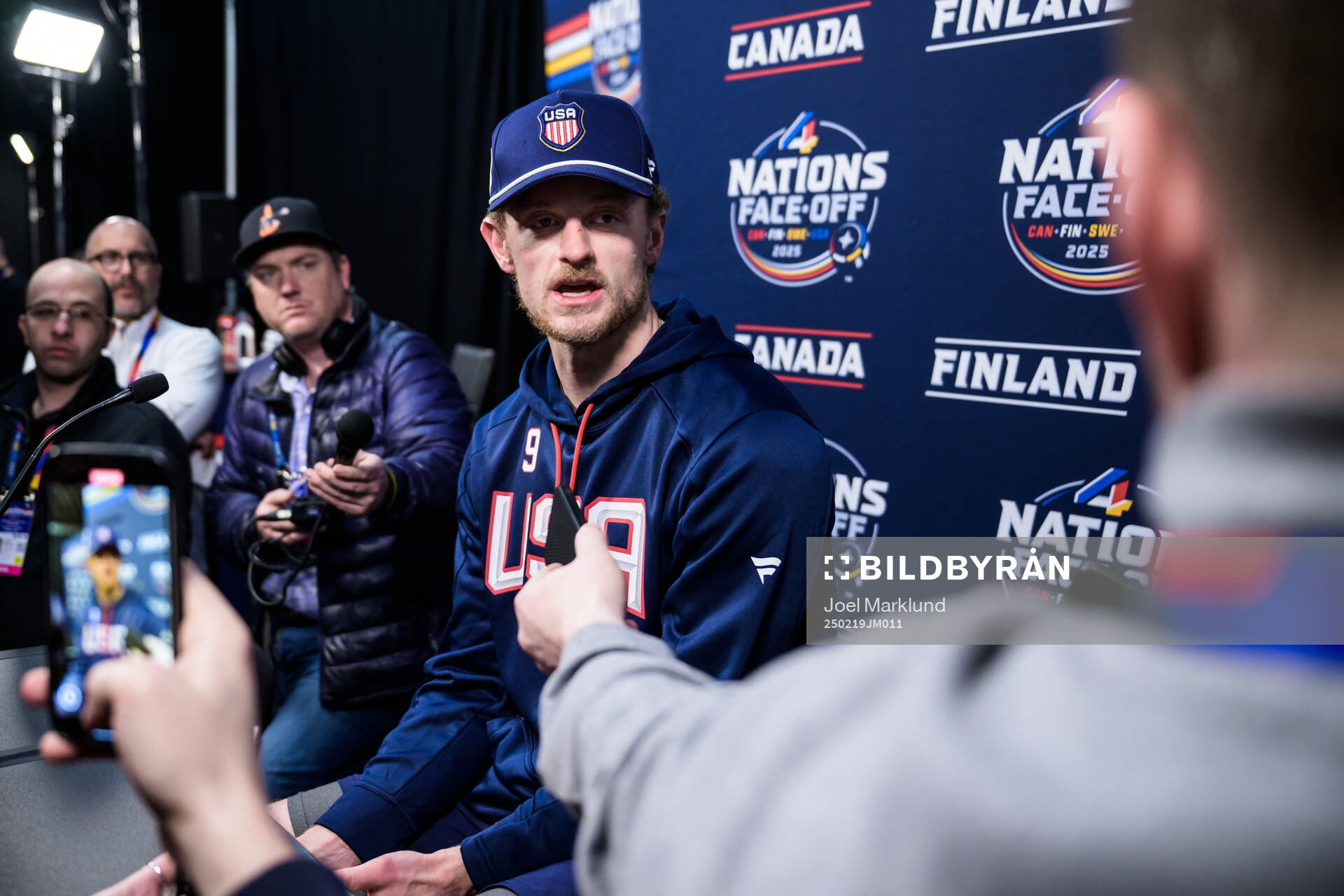 Jack Eichel of USA is being interviewed by media