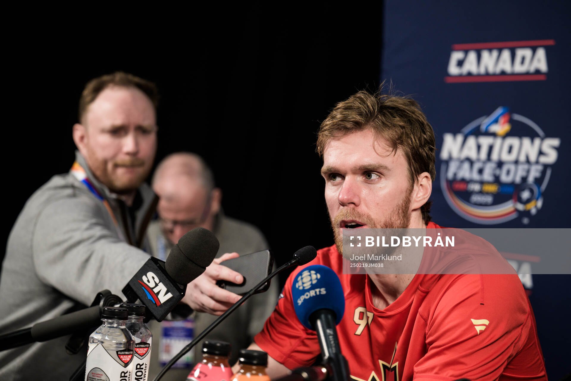 Connor McDavid of Canada is being interviewed by media