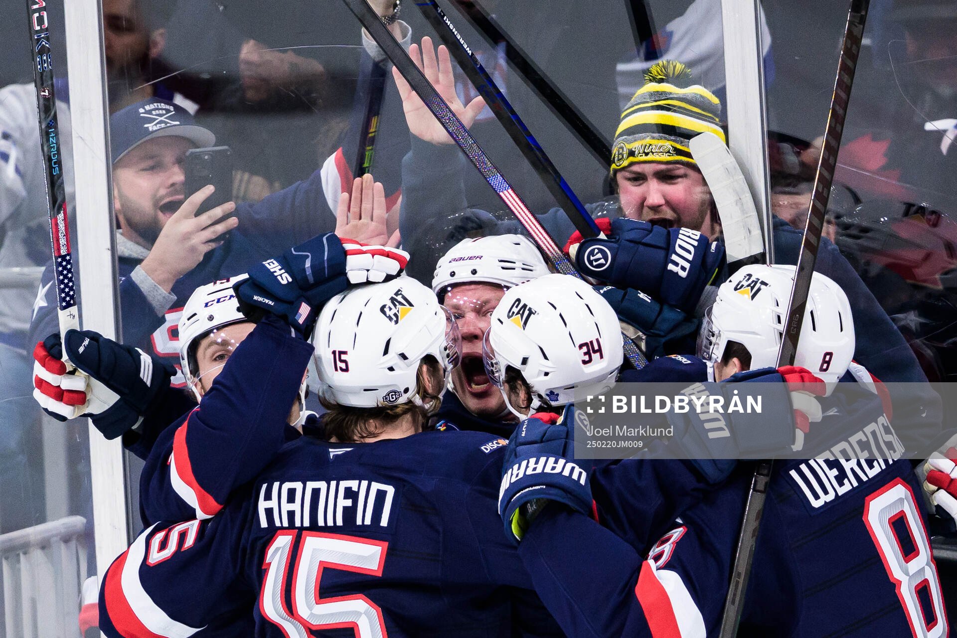 Brady Tkachuk of USA celebrates with teammates