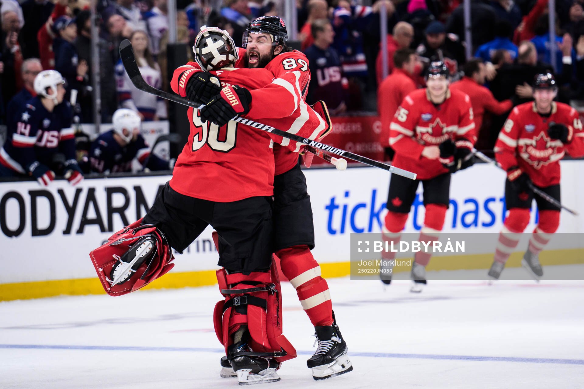 Goaltender Jordan Binnington and Drew Doughty of Canada