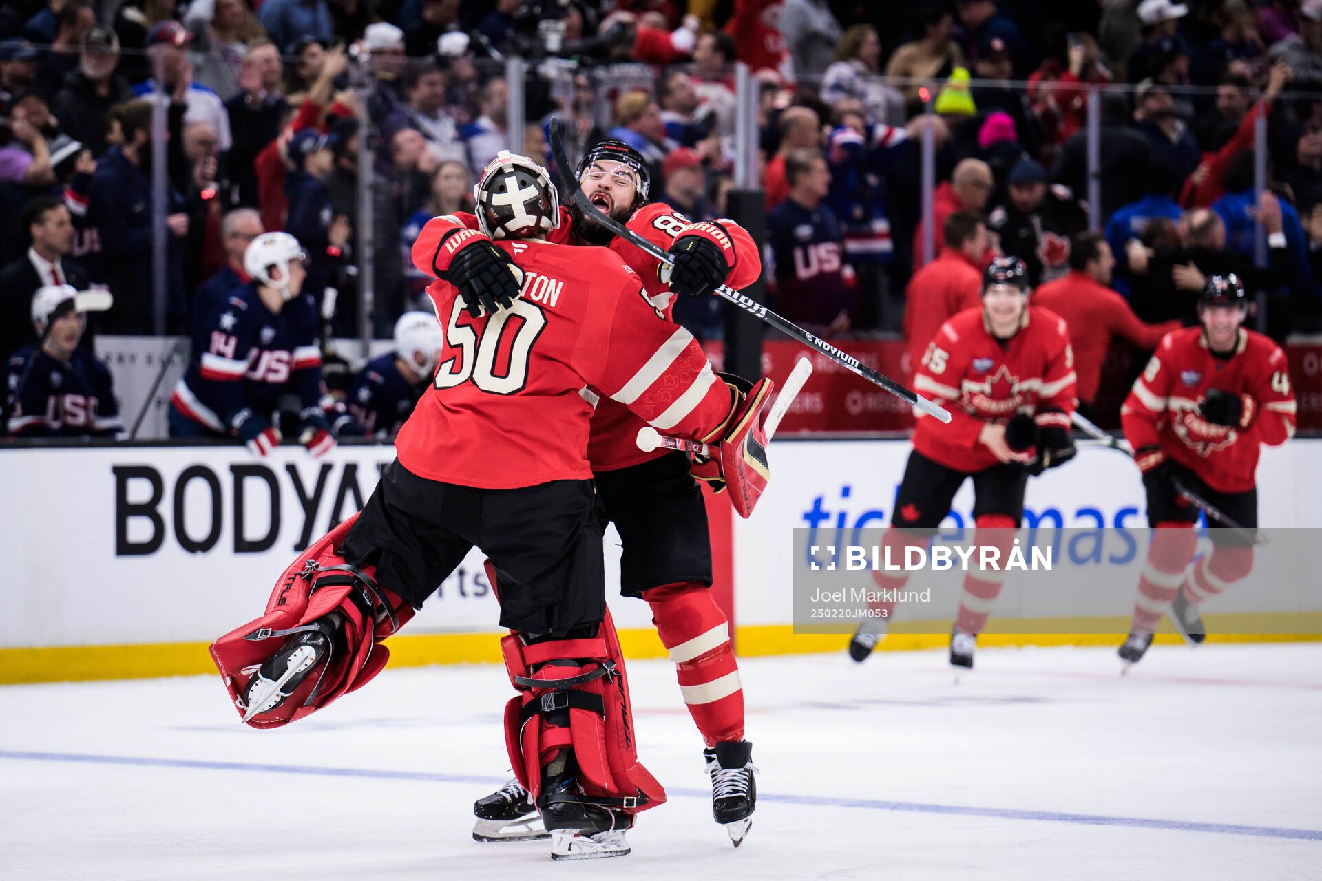 Goaltender Jordan Binnington and Drew Doughty of Canada