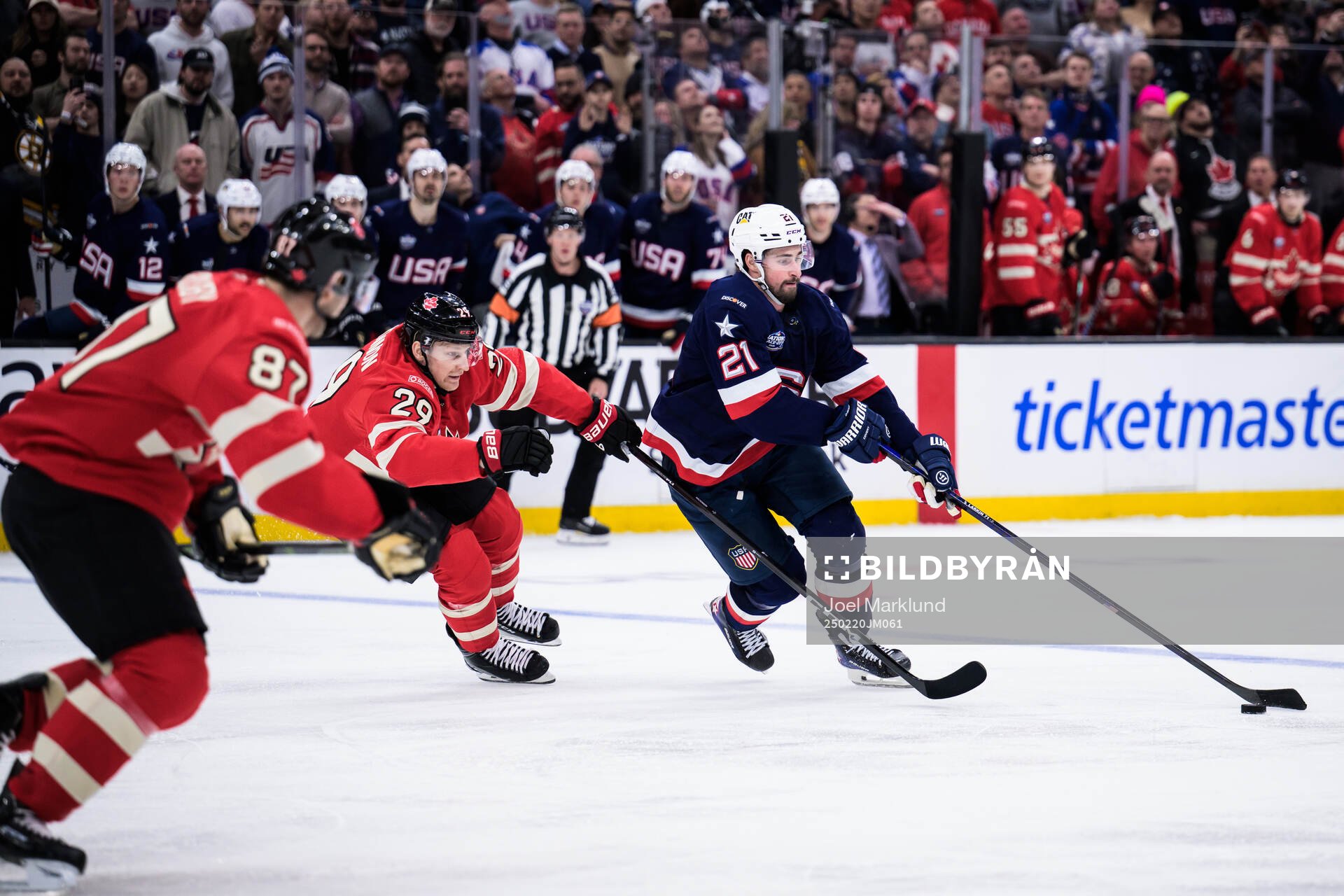 Nathan MacKinnon of Canada and Dylan Larkin of USA