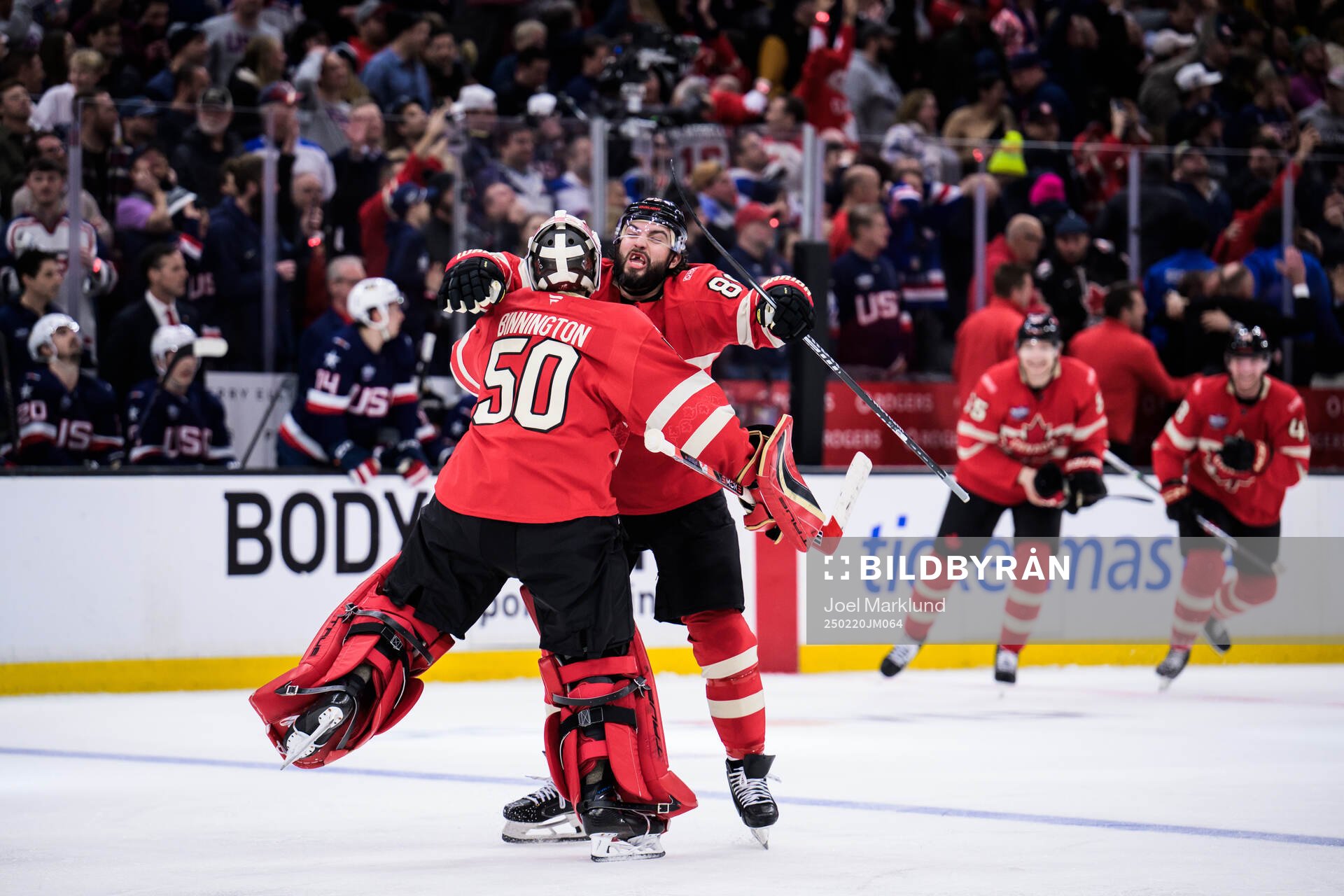 Goaltender Jordan Binnington and Drew Doughty of Canada