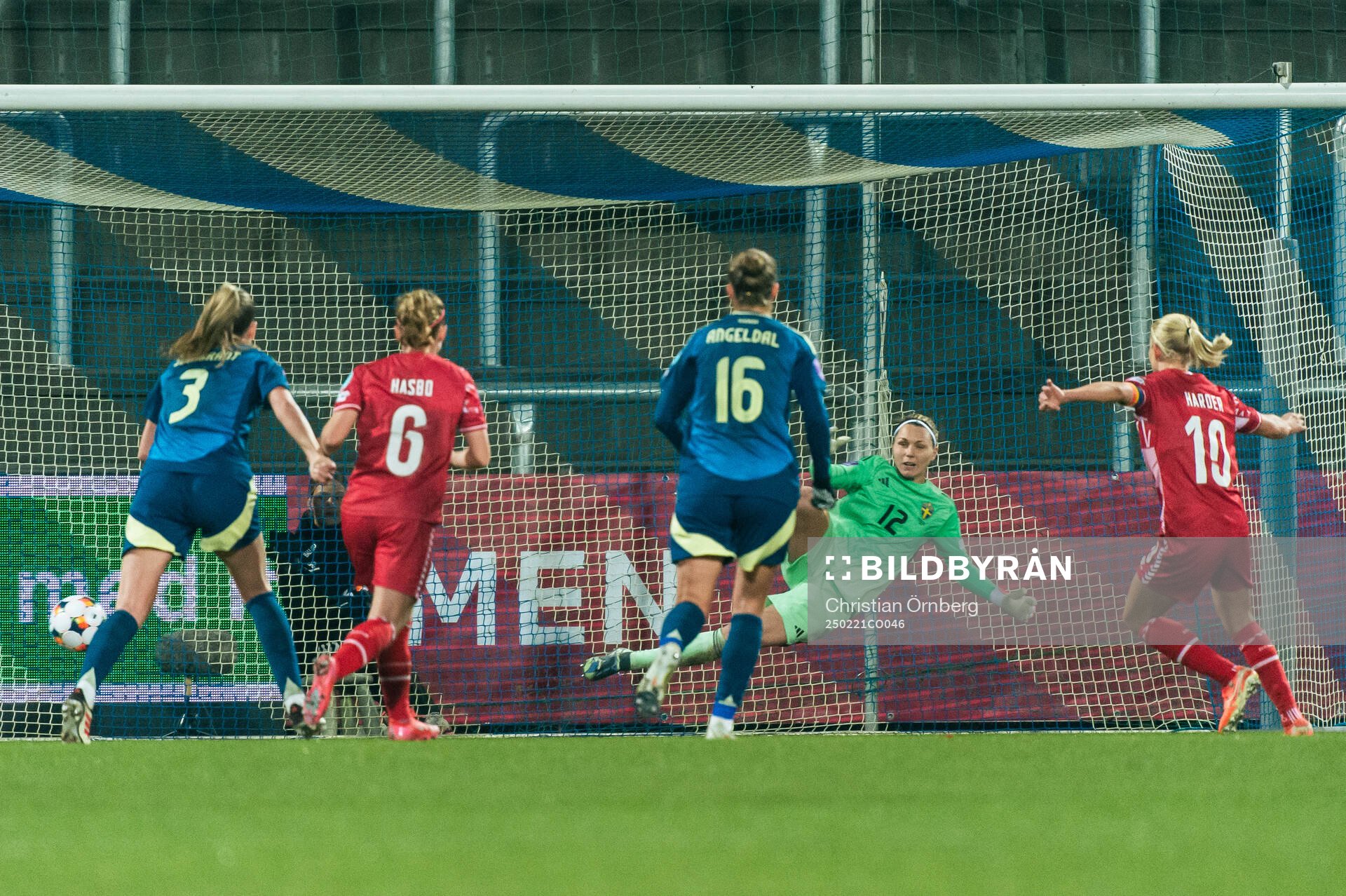 Pernille Harder of Denmark scores the 1-1 goal behind