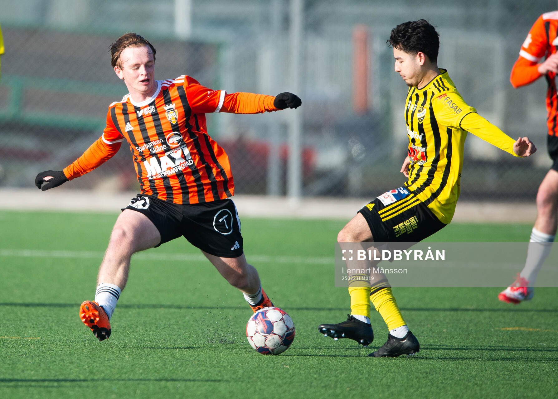 ristianstads Sam Hegdal och IFK Hässleholms Ali Reza Nazari i träningsmatchen mellan Kristianstads FC och IFK Hässleholm i Kristianstad 21 februari 2025.