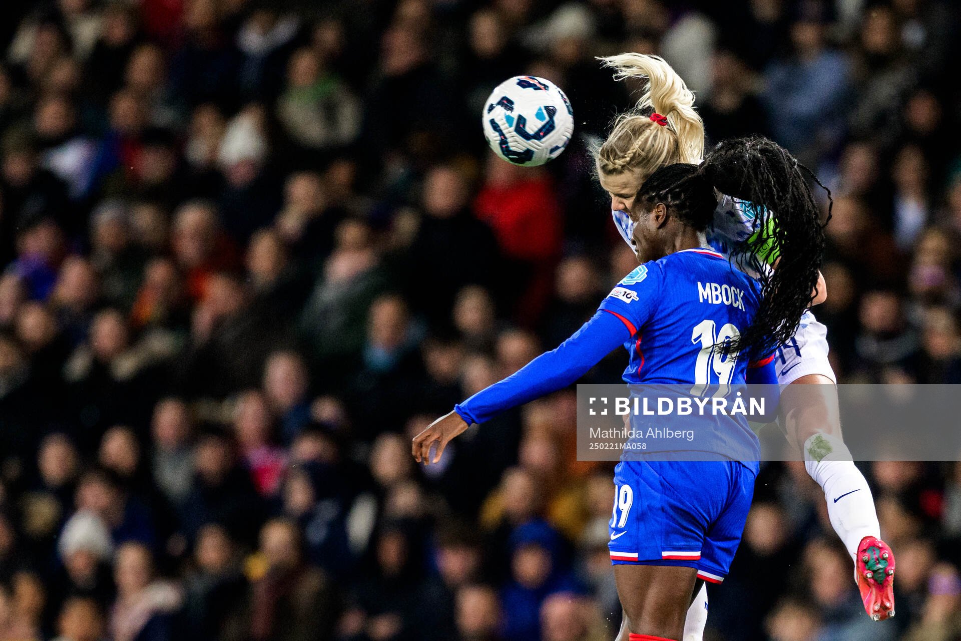 Griedge Mbock Bathy of France and Ada Hegerberg of Norway