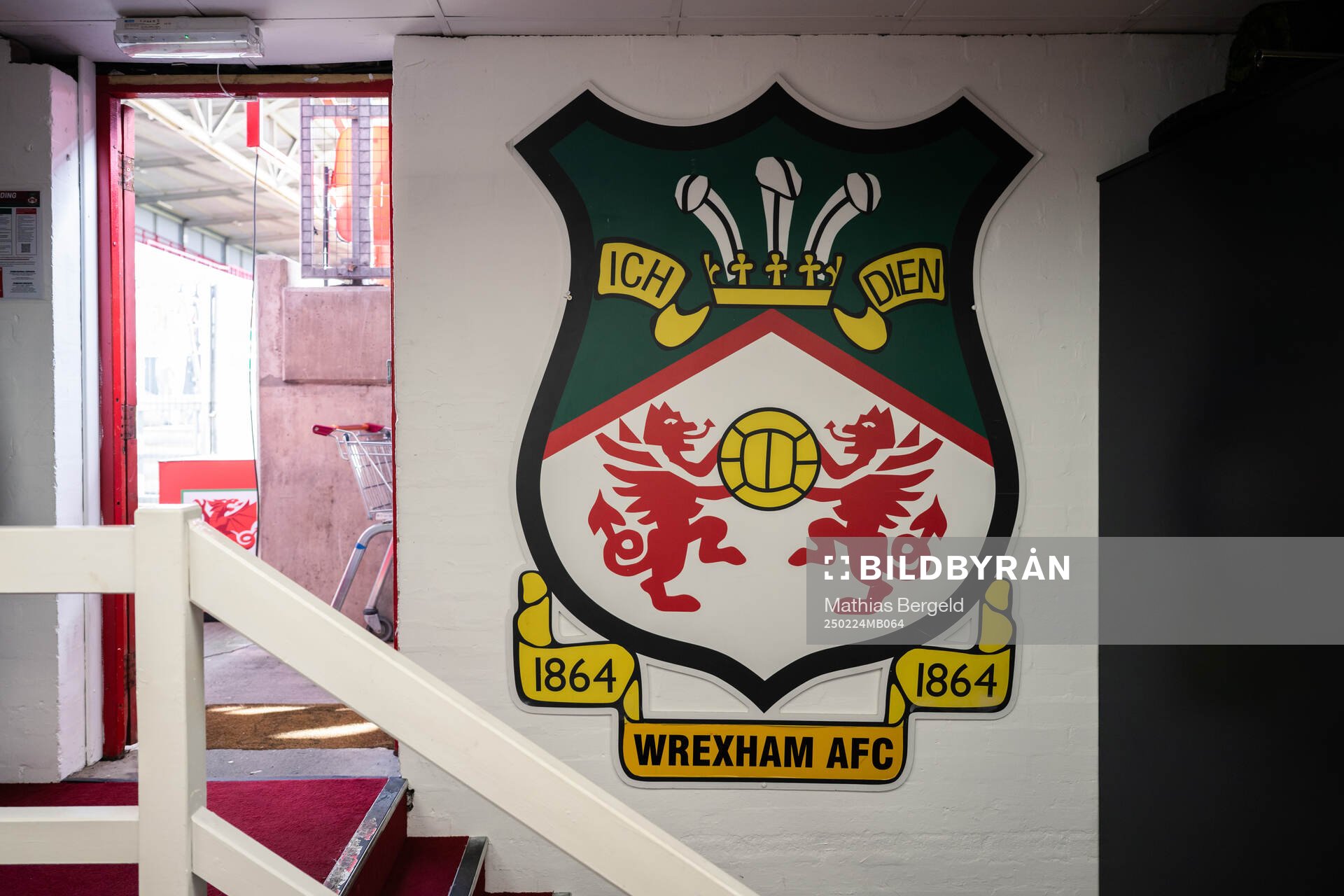 The club Crest of Wrexham is seen on a wall on February 24, 2025 in Wrexham. 