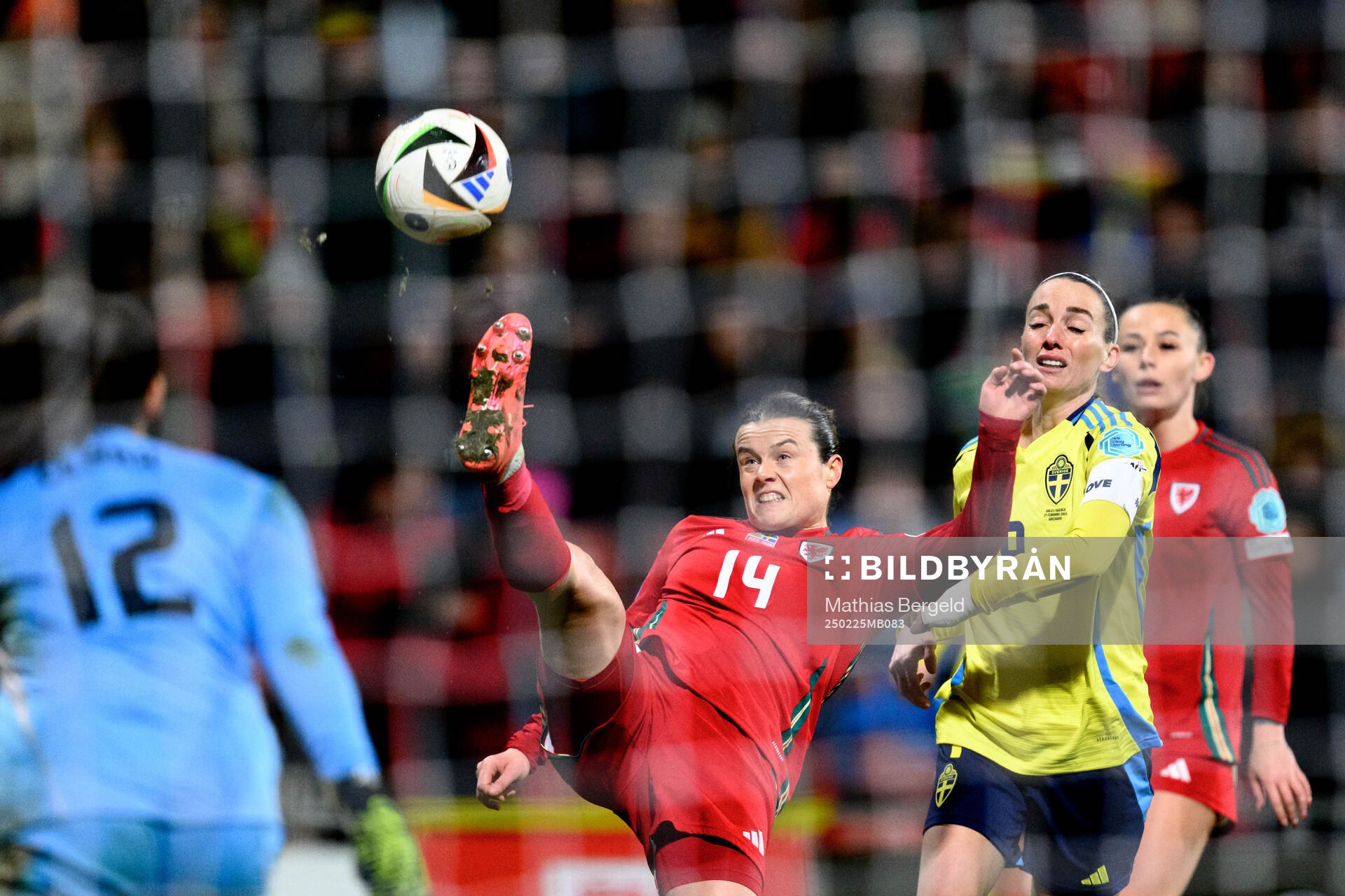 Hayley Ladd of Wales and Kosovare Asllani of Sweden