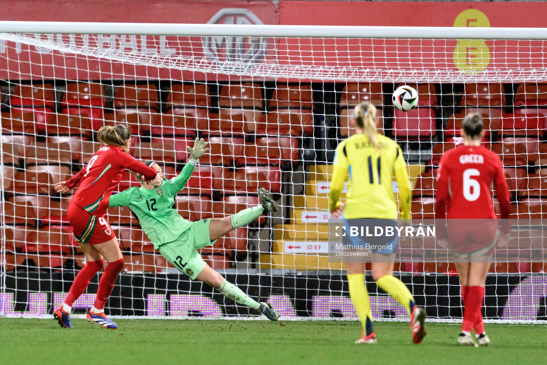 Kayleigh Barton of Wales scores 1-1