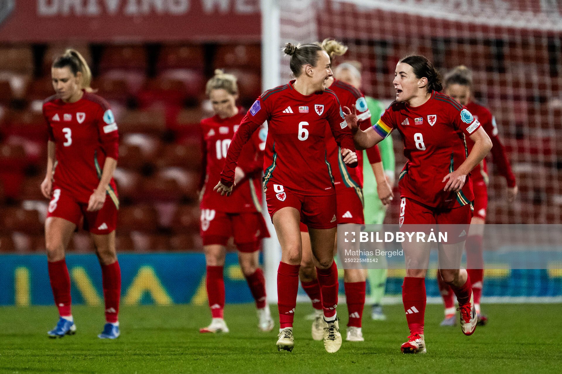 Josie Green and Angharad James of Wales celebrate