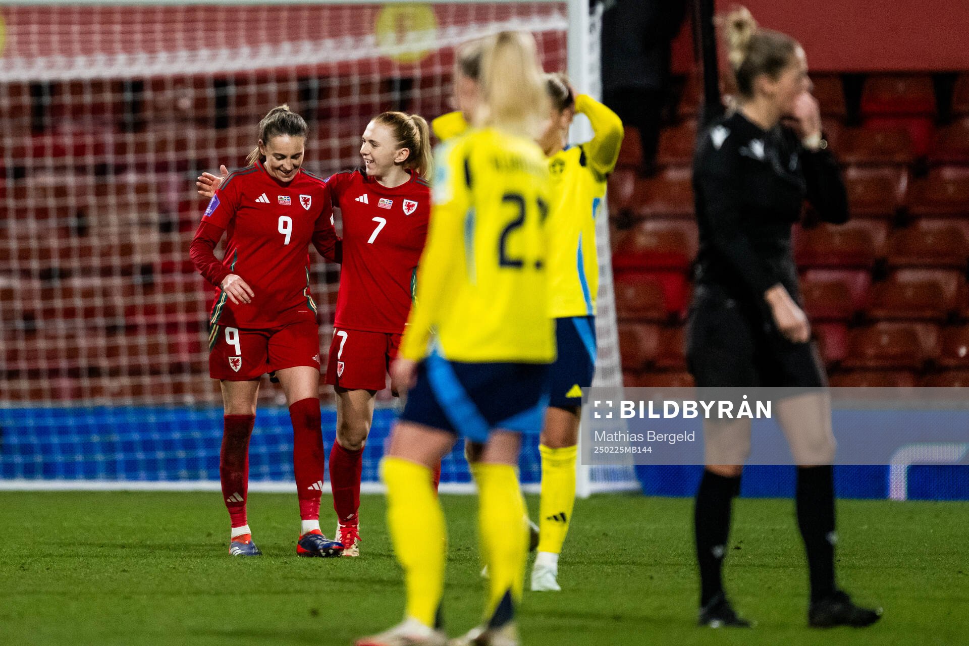 Kayleigh Barton of Wales scored 1-1 and celebrates with